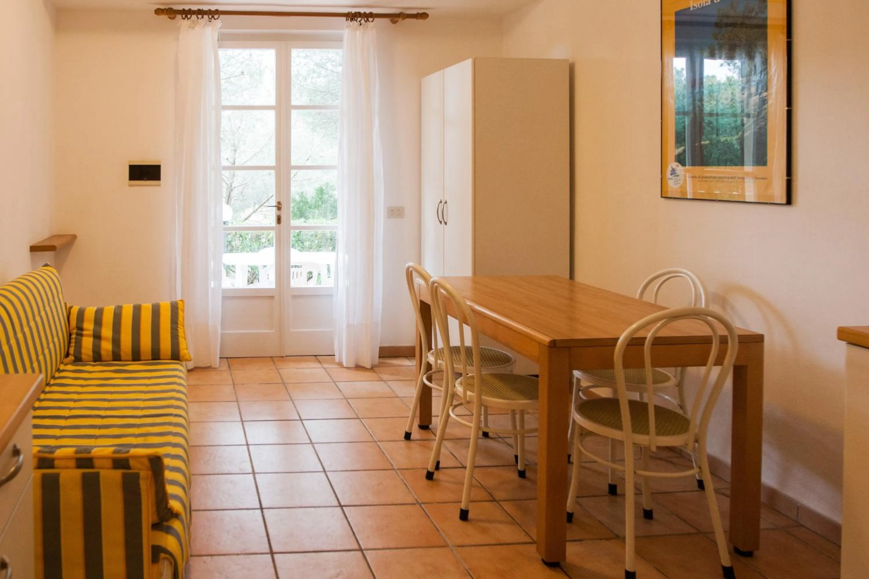 Dining area in Residence Le Mimose