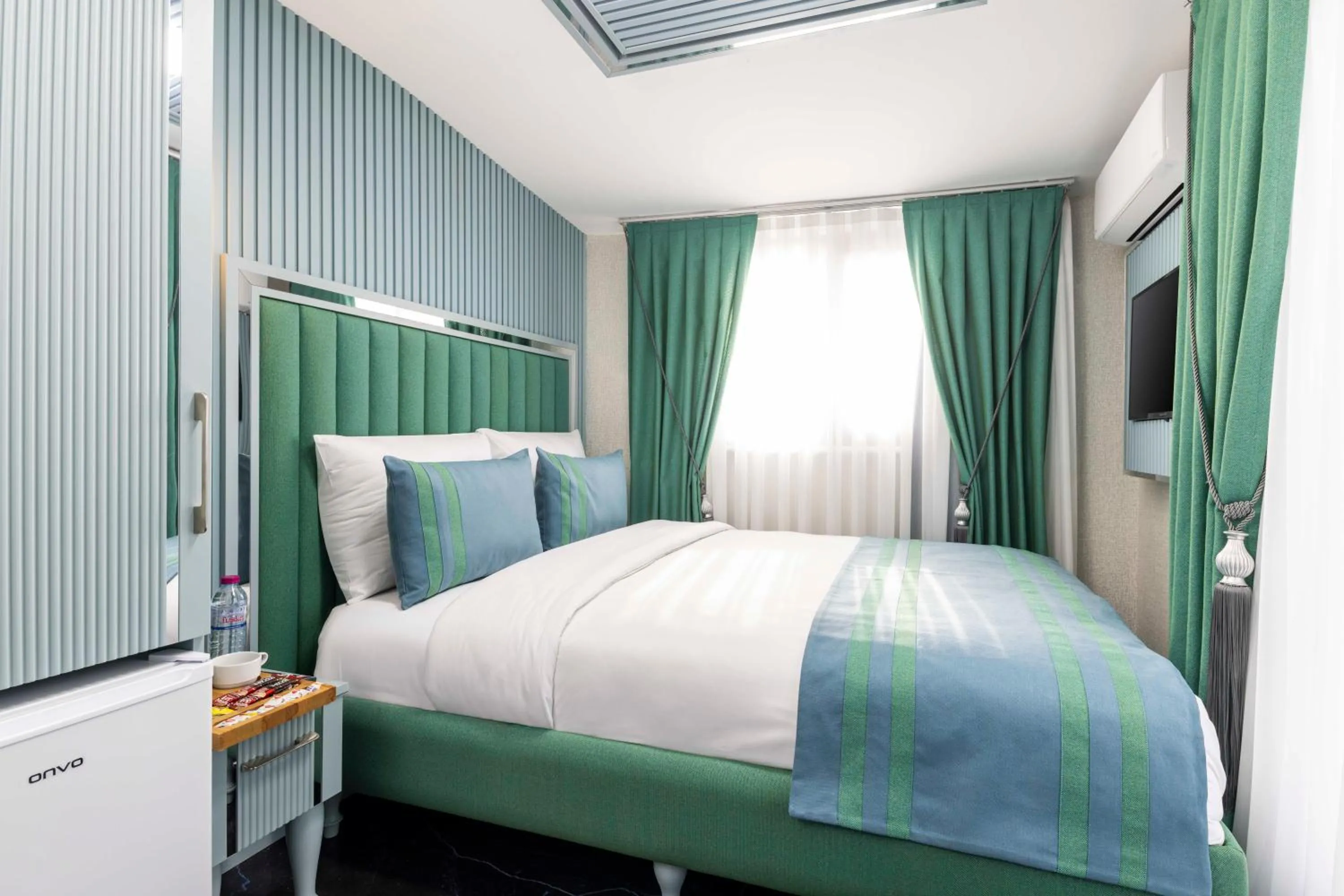 Photo of the whole room, Bed in Santa Rio Gold Taxim Hotel