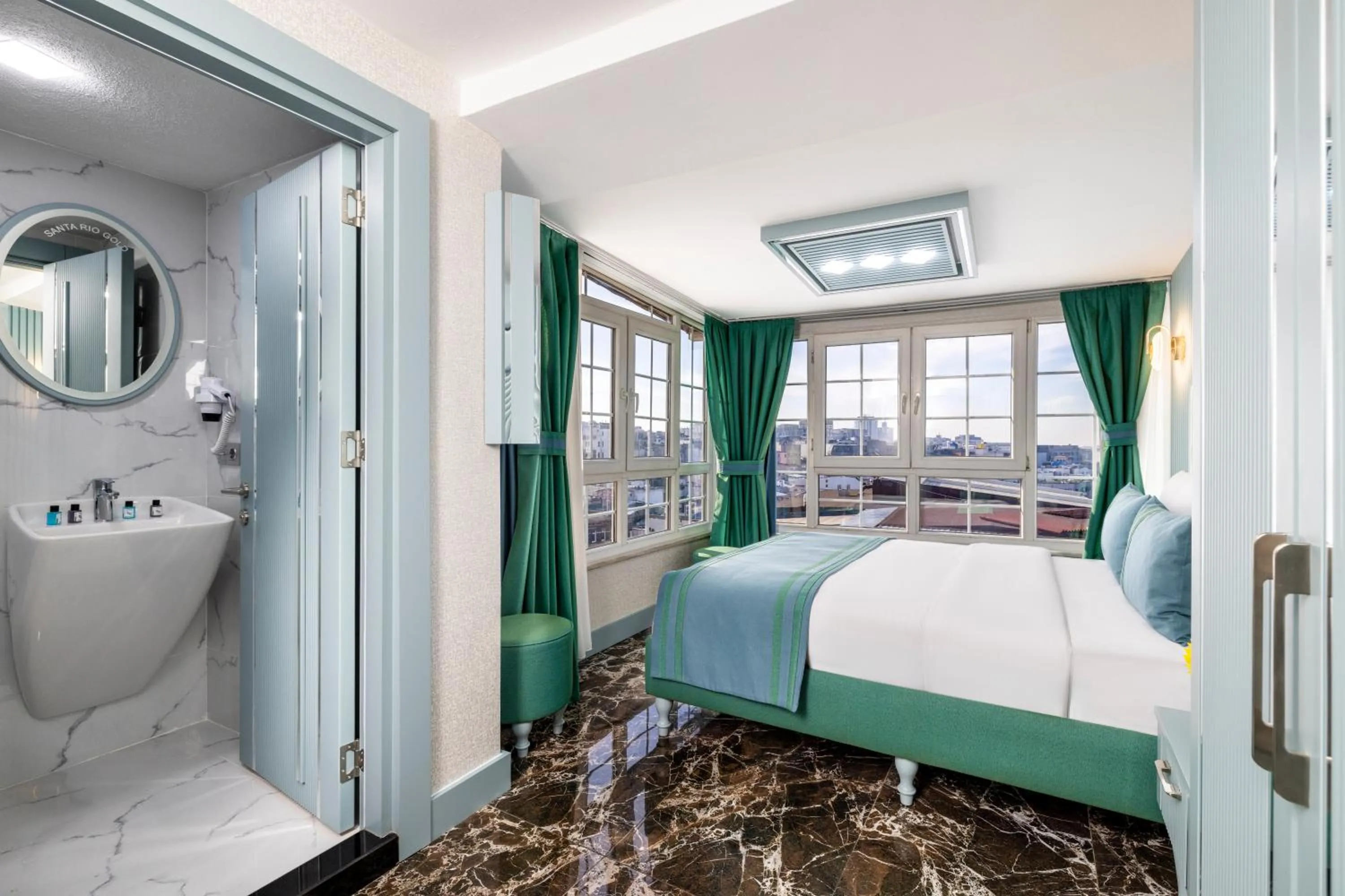 Bed in Santa Rio Gold Taxim Hotel