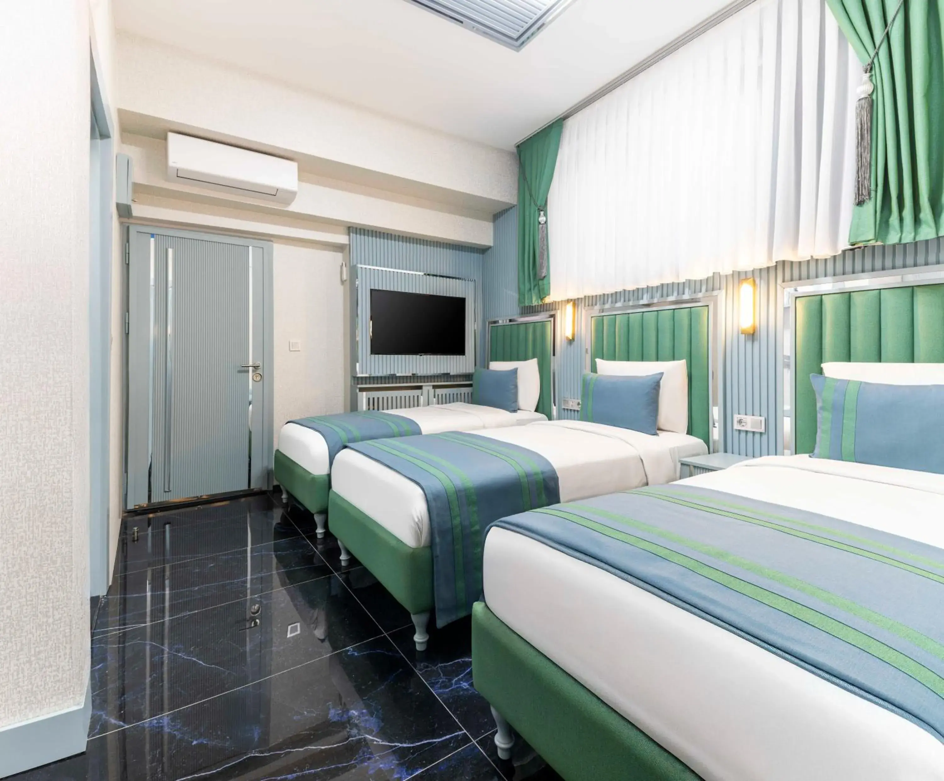 Bed in Santa Rio Gold Taxim Hotel Bed in Santa Rio Gold Taxim Hotel