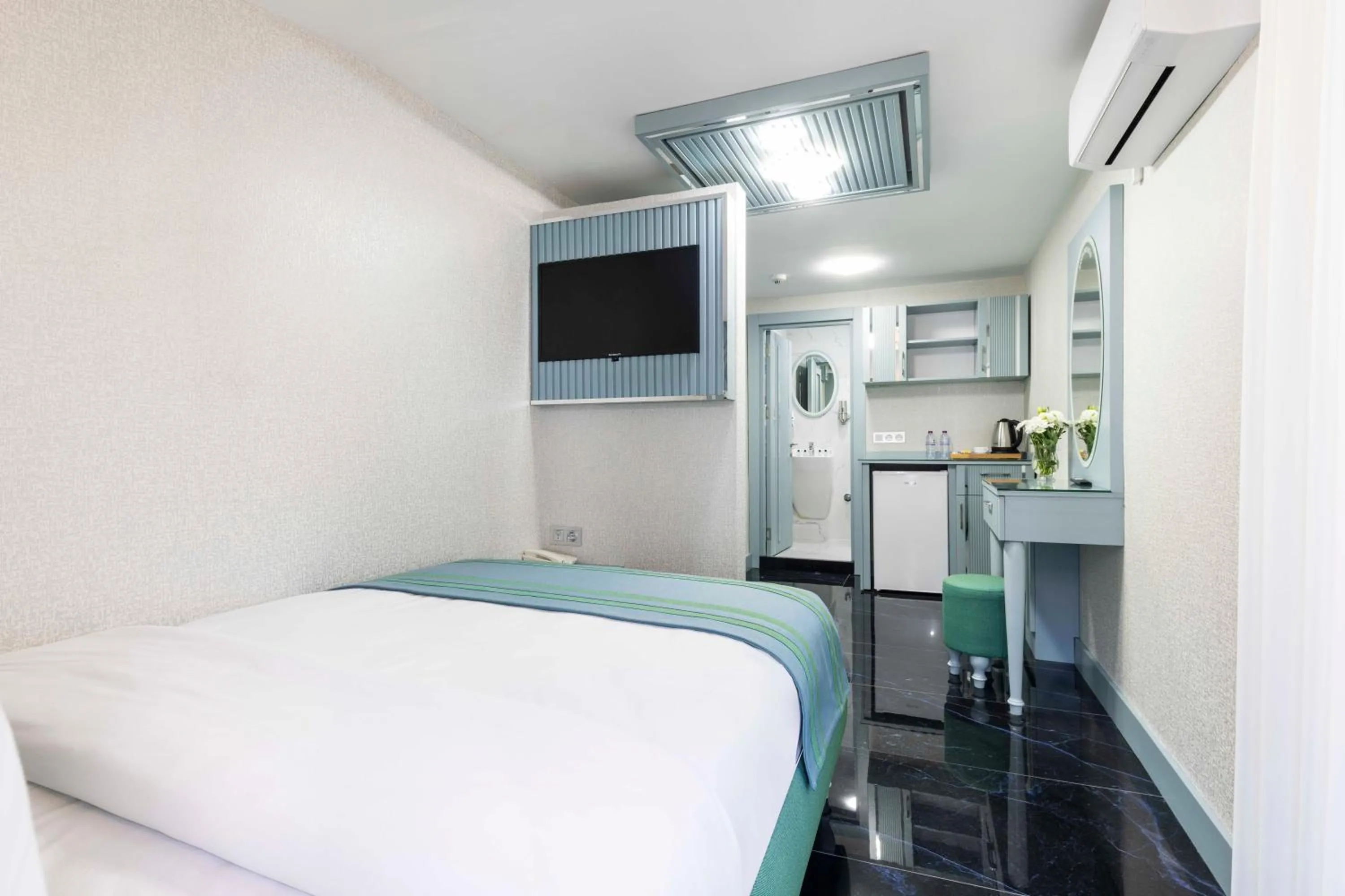 Bed in Santa Rio Gold Taxim Hotel