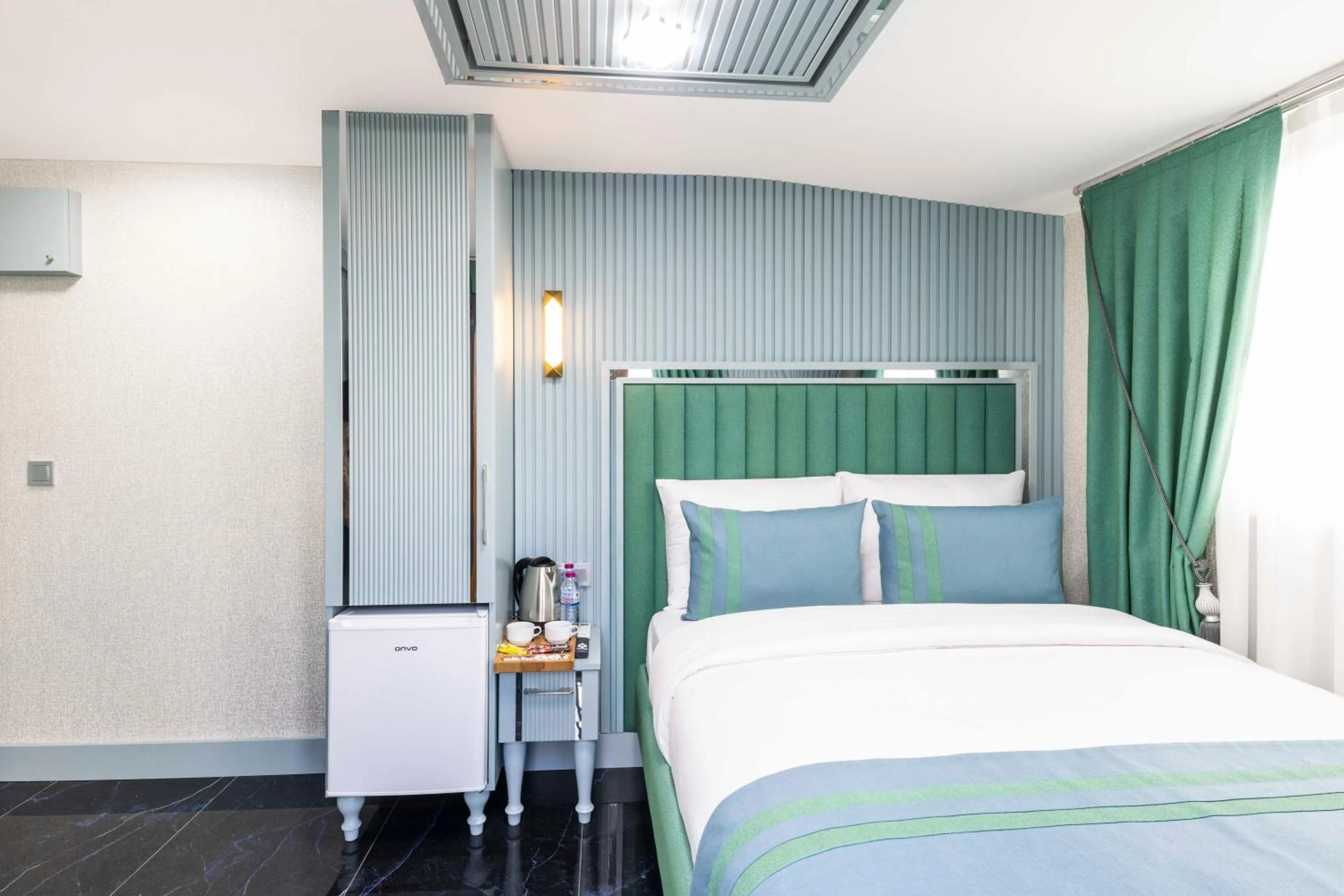 Bed in Santa Rio Gold Taxim Hotel