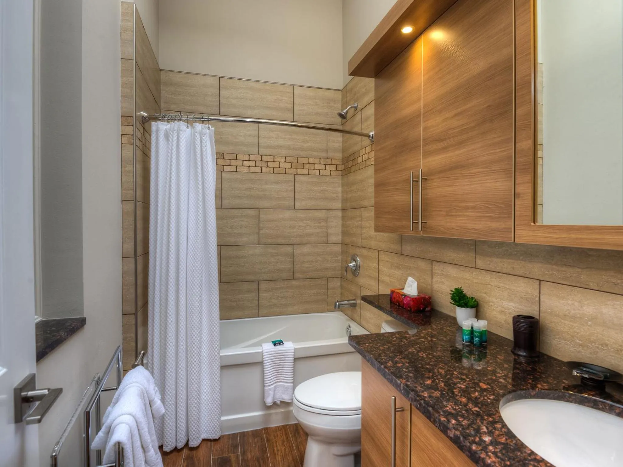 Bathroom in Western Hotel & Executive Suites