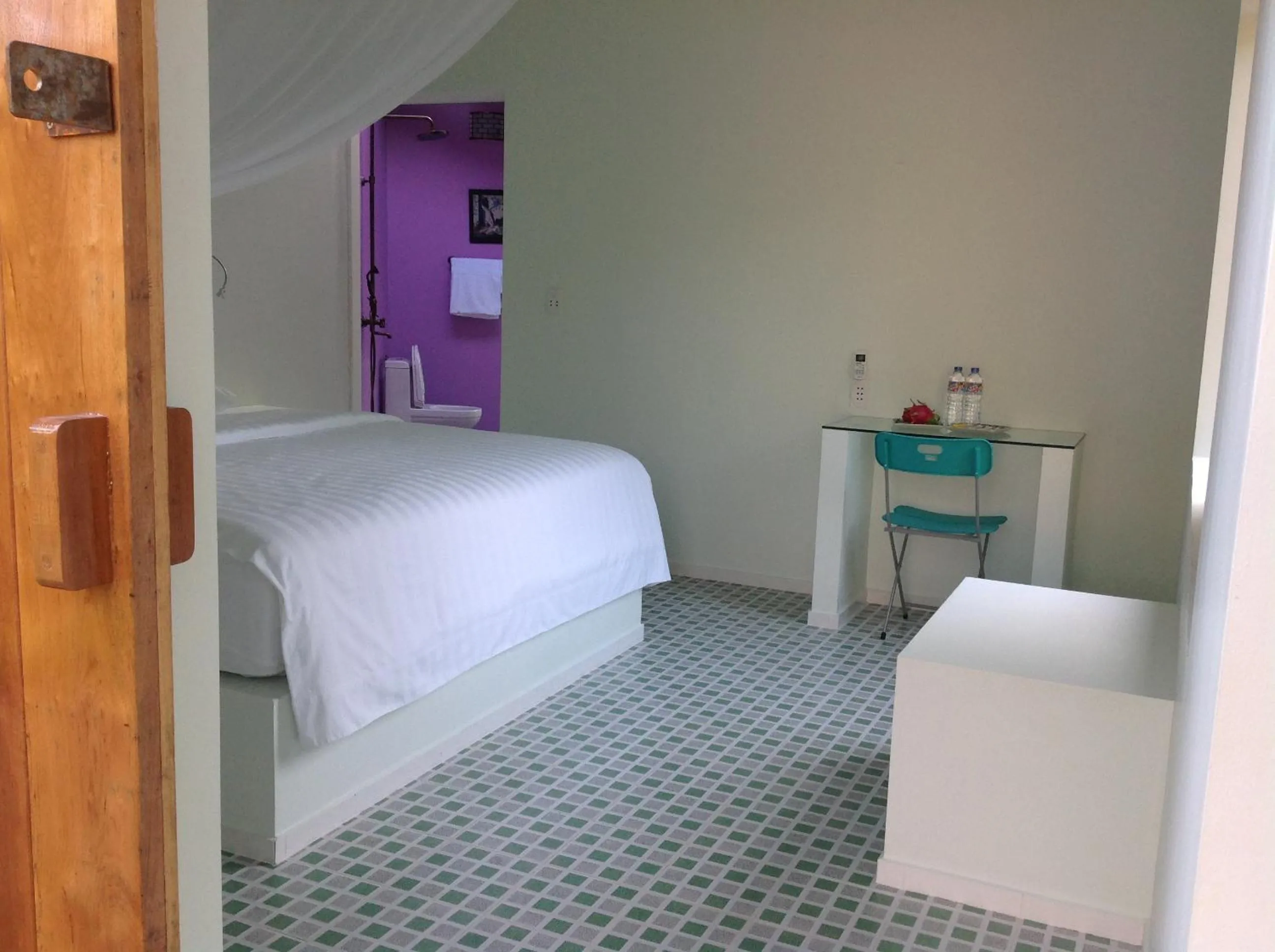 Photo of the whole room, Bed in The Durian Lodge at Mekong