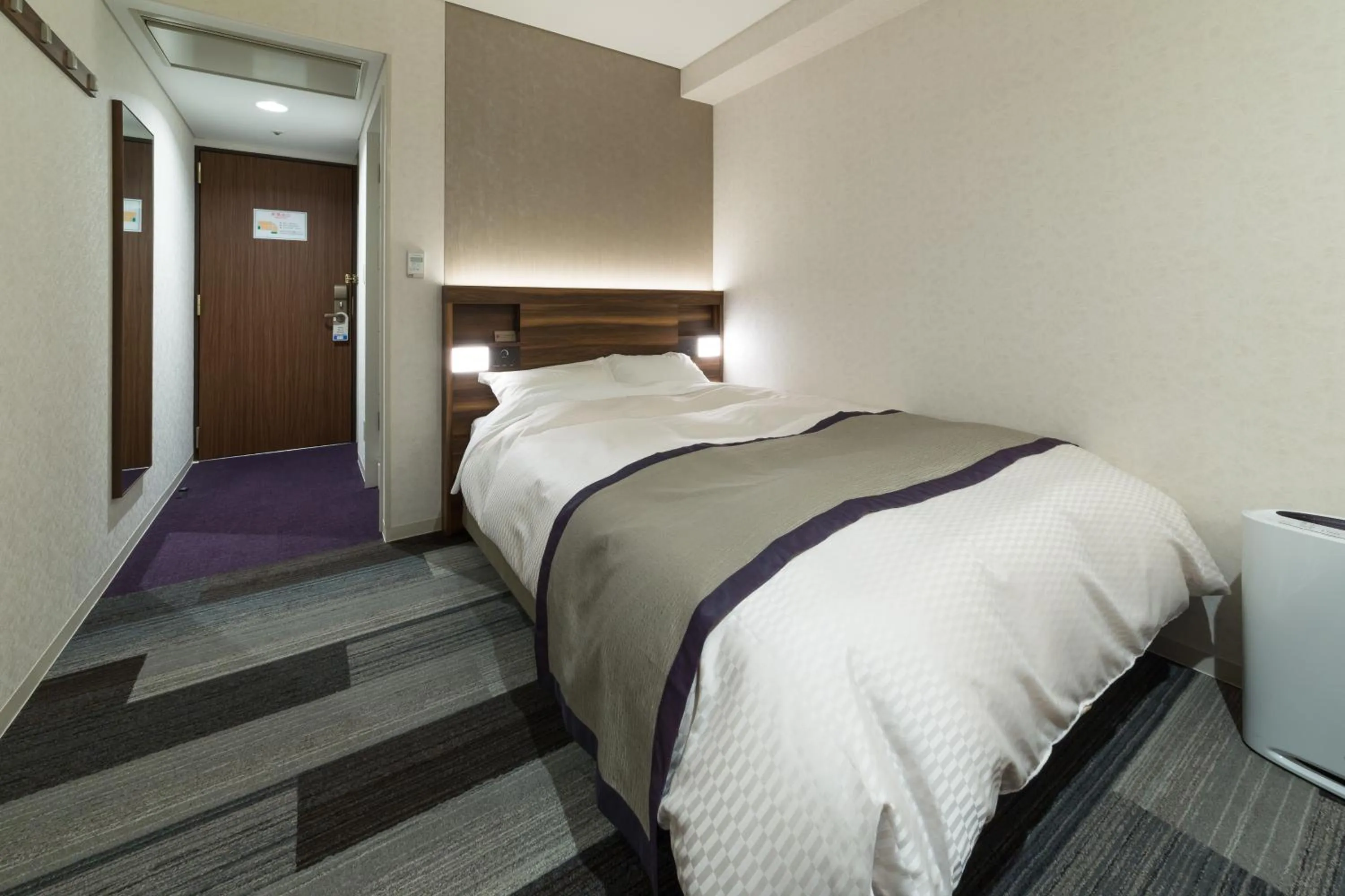 Bed in Kochi Pacific Hotel