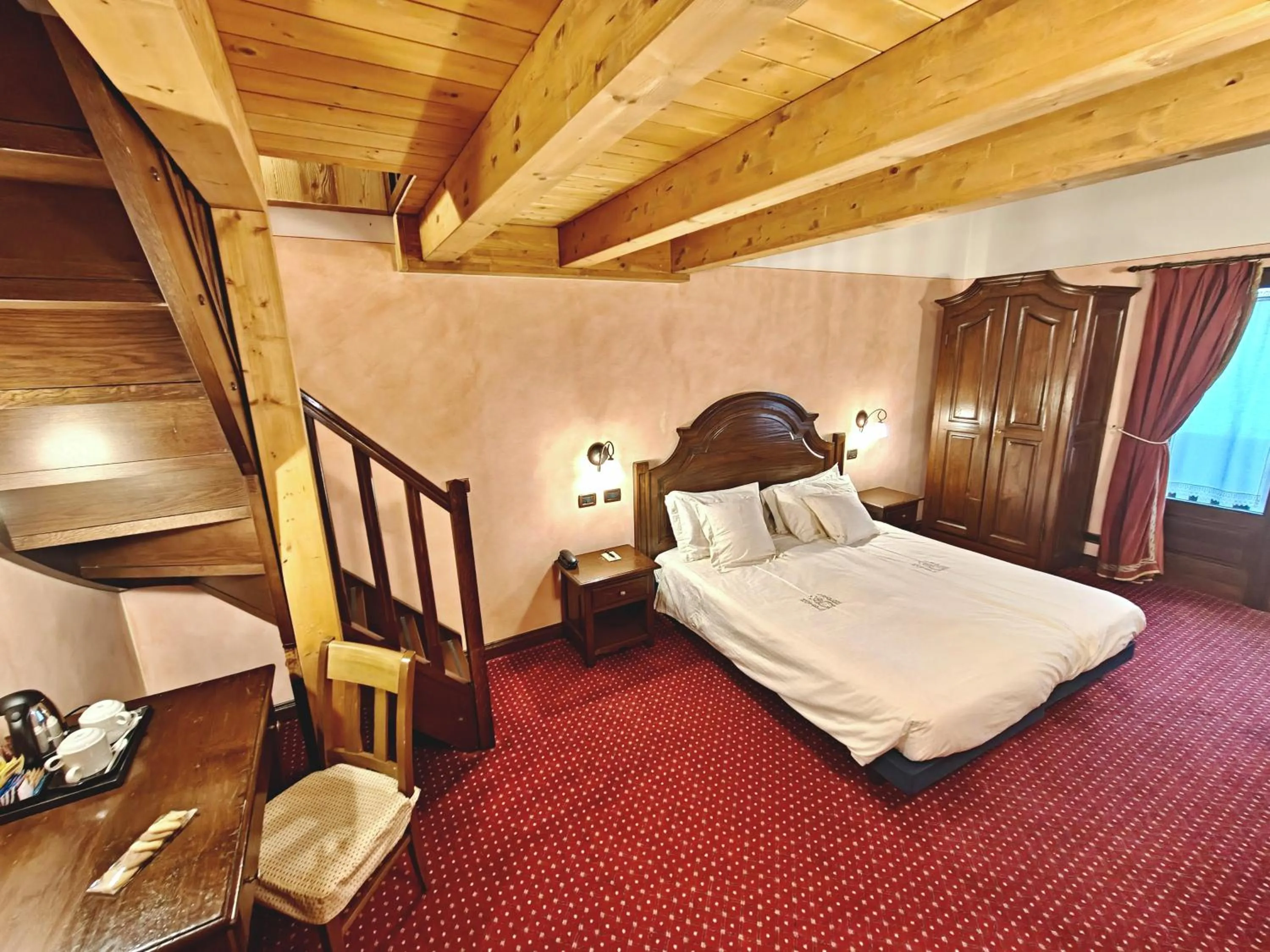 Bed in Hotel L' Aiglon