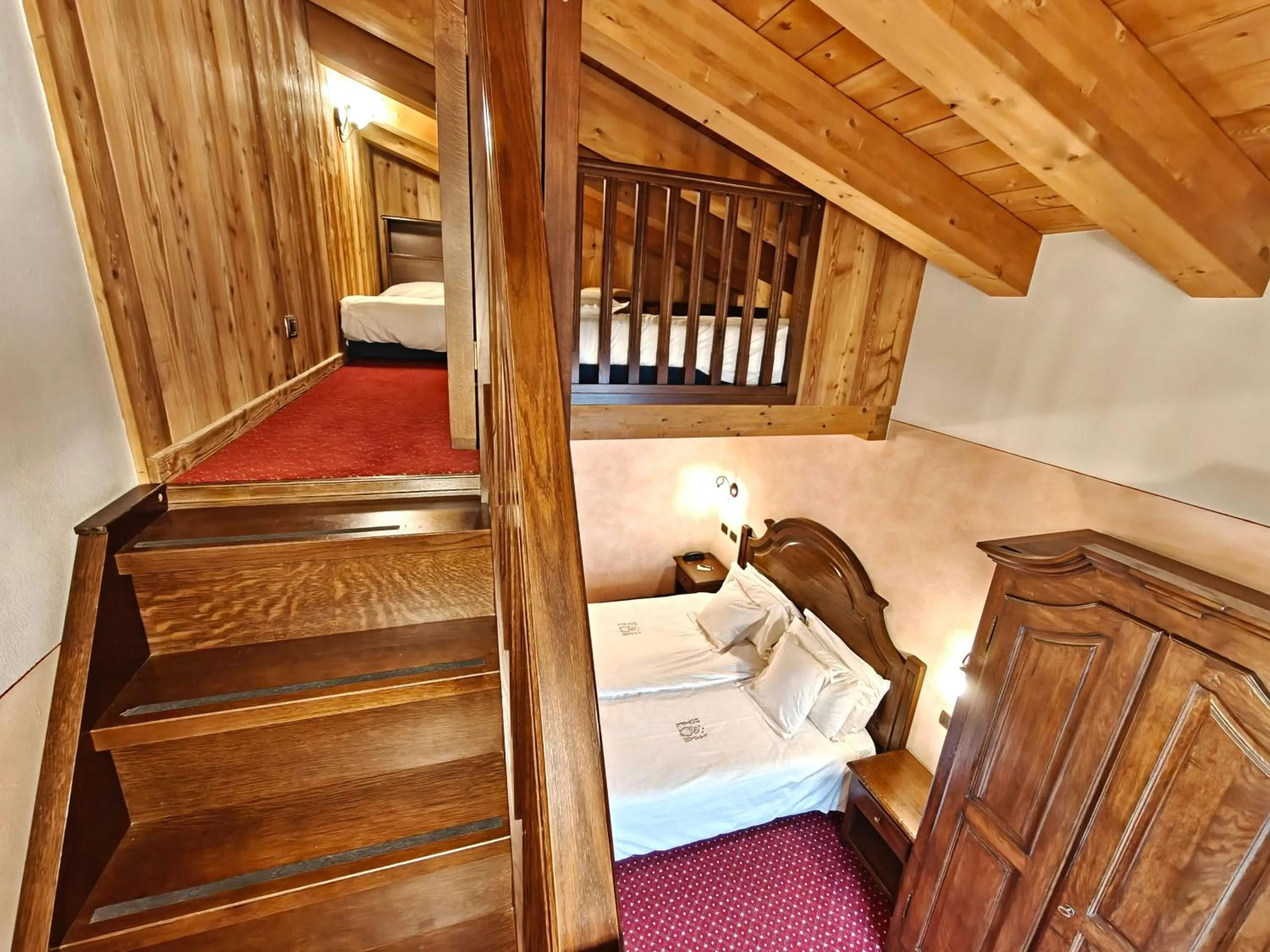 Bed in Hotel L' Aiglon