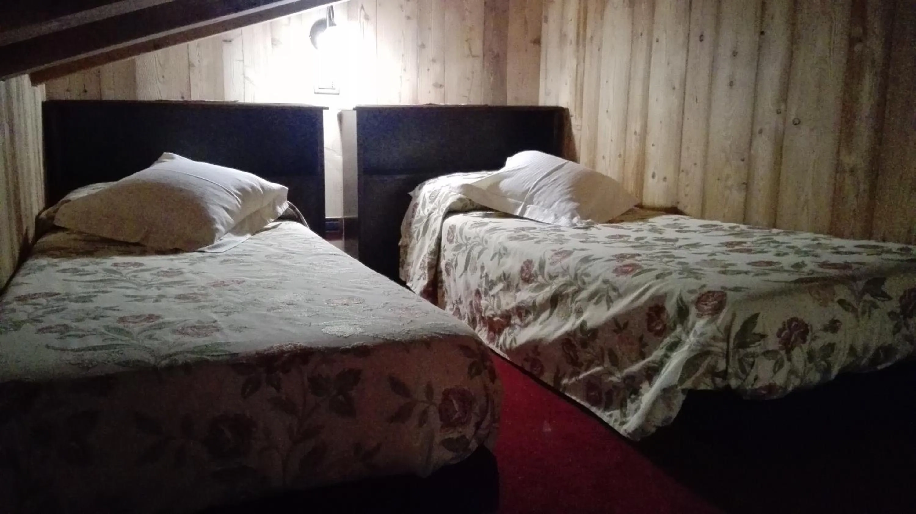 Bed in Hotel L' Aiglon