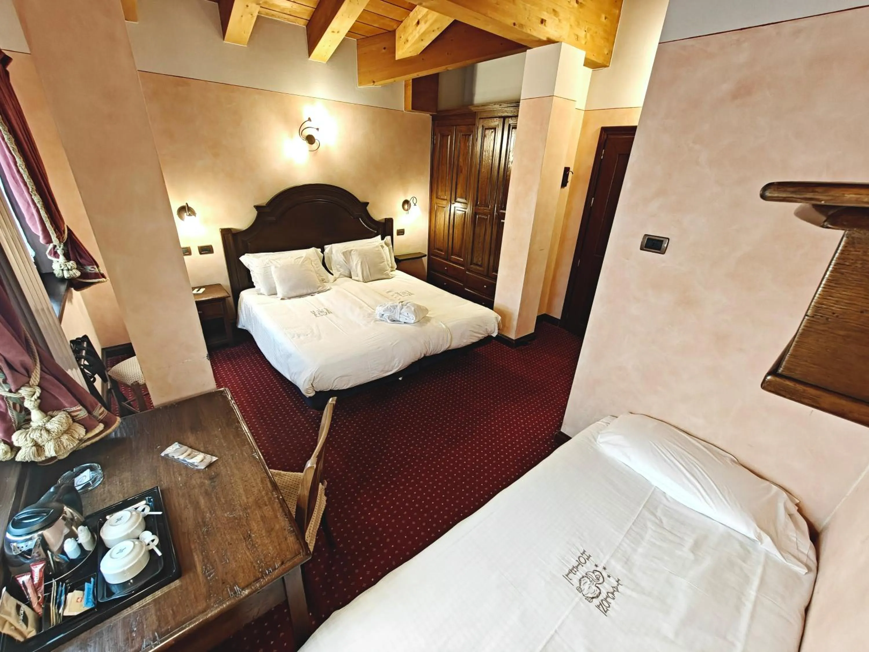 Bed in Hotel L' Aiglon