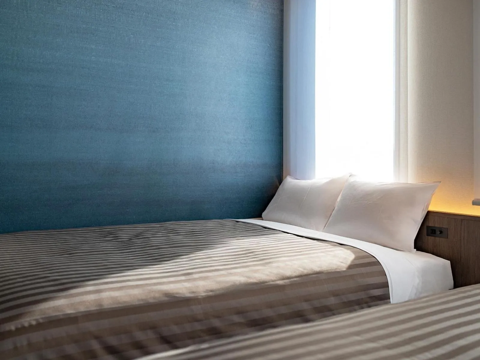 Bed in The OneFive Tokyo Kameido