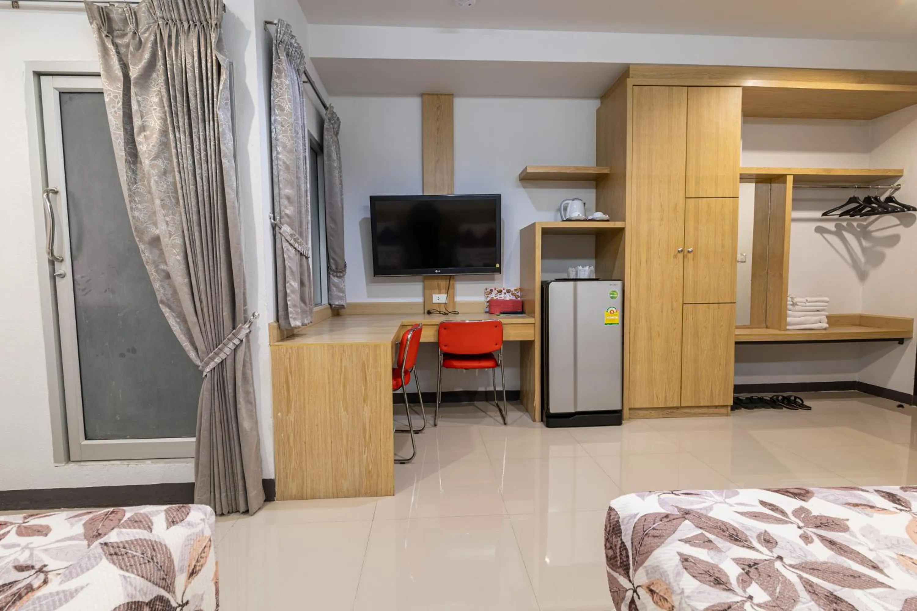 Bed in The Rama Hotel