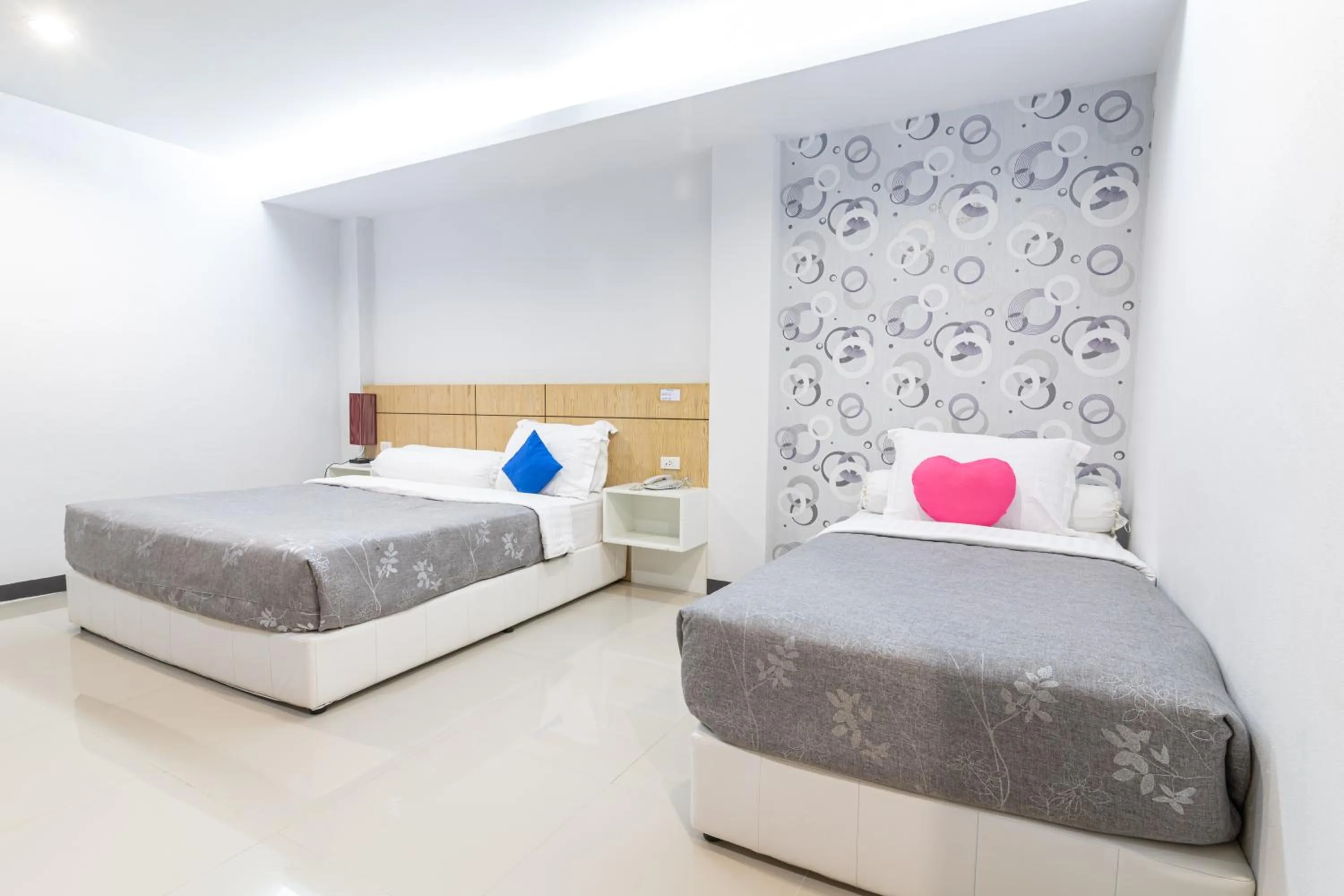 Bed in The Rama Hotel