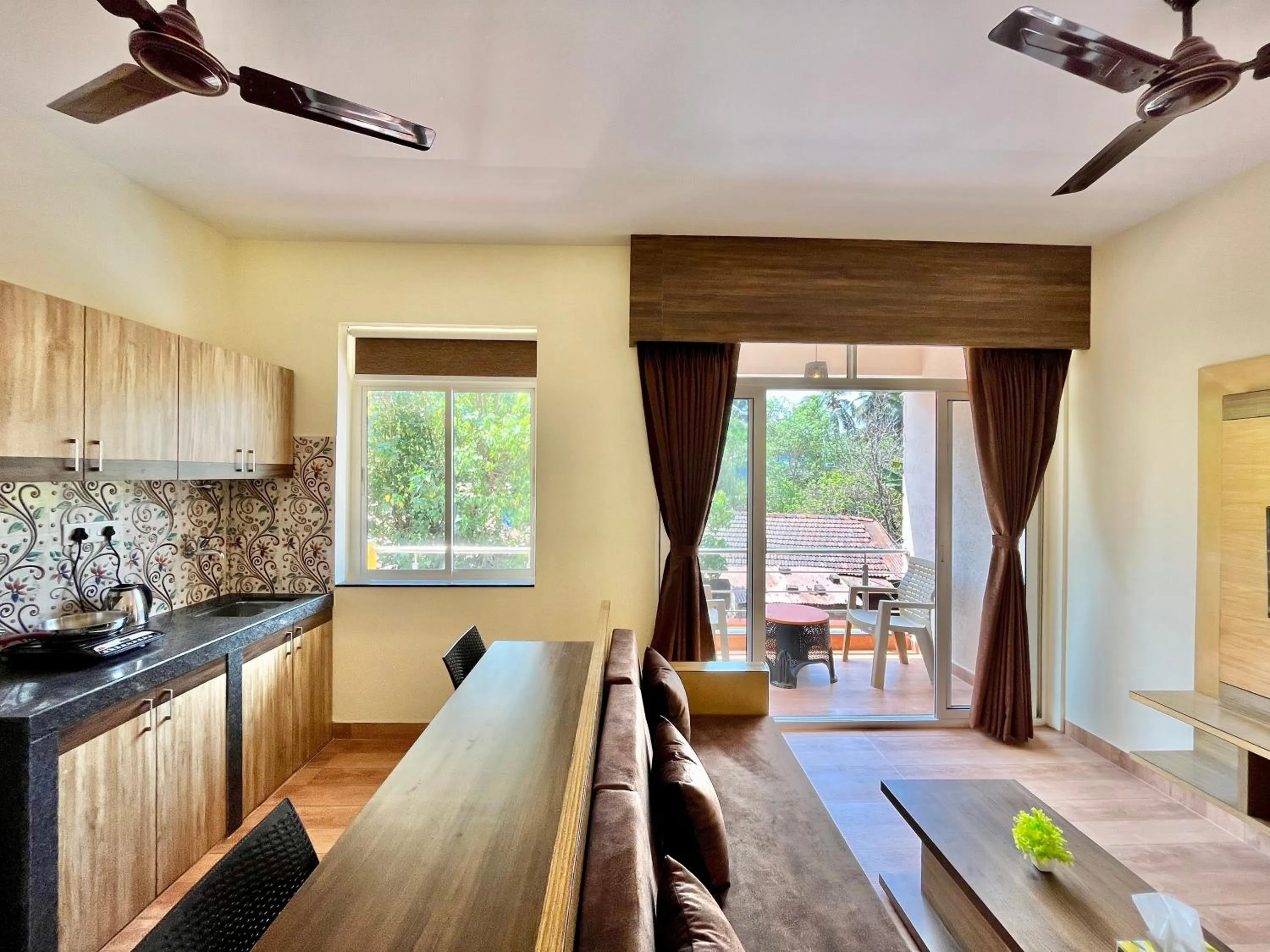 Kitchen or kitchenette in Lykke Suites- 2-min Drive to Colva Beach-By Goan Felicidade Hospitality PVT LTD