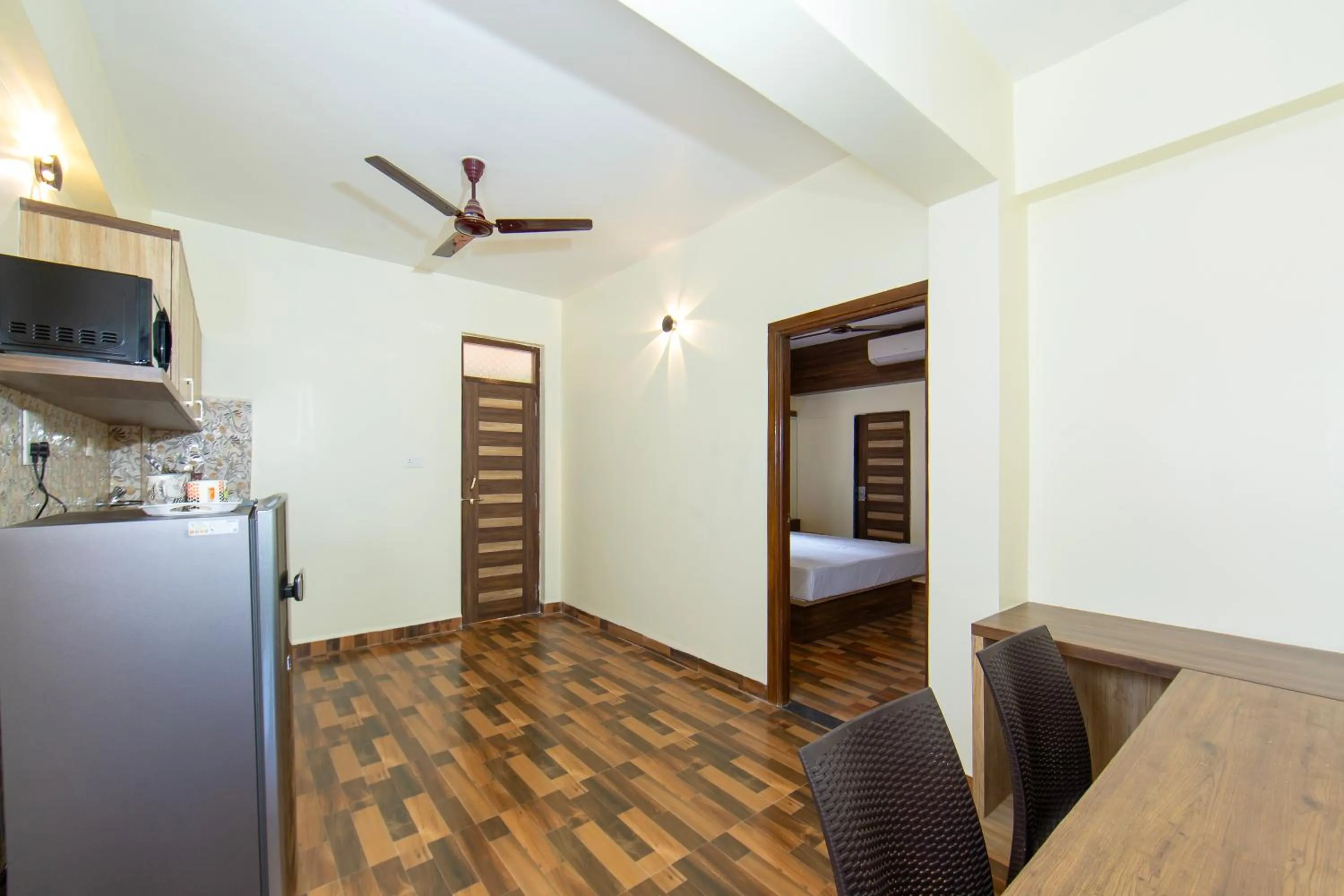 Kitchen or kitchenette, Bed in Lykke Suites- 2-min Drive to Colva Beach-By Goan Felicidade Hospitality PVT LTD