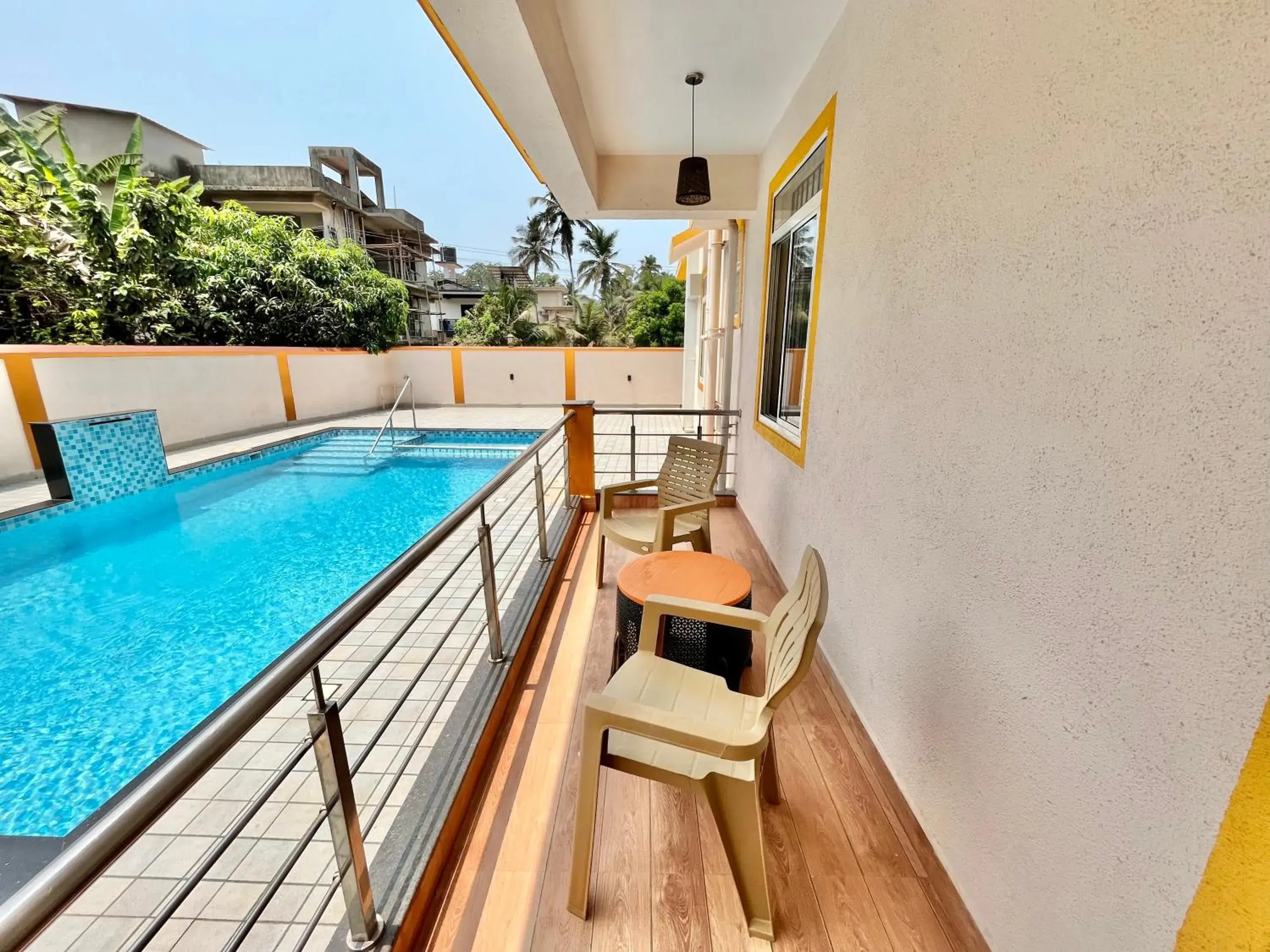 Swimming pool in Lykke Suites- 2-min Drive to Colva Beach-By Goan Felicidade Hospitality PVT LTD Swimming pool in Lykke Suites- 2-min Drive to Colva Beach-By Goan Felicidade Hospitality PVT LTD