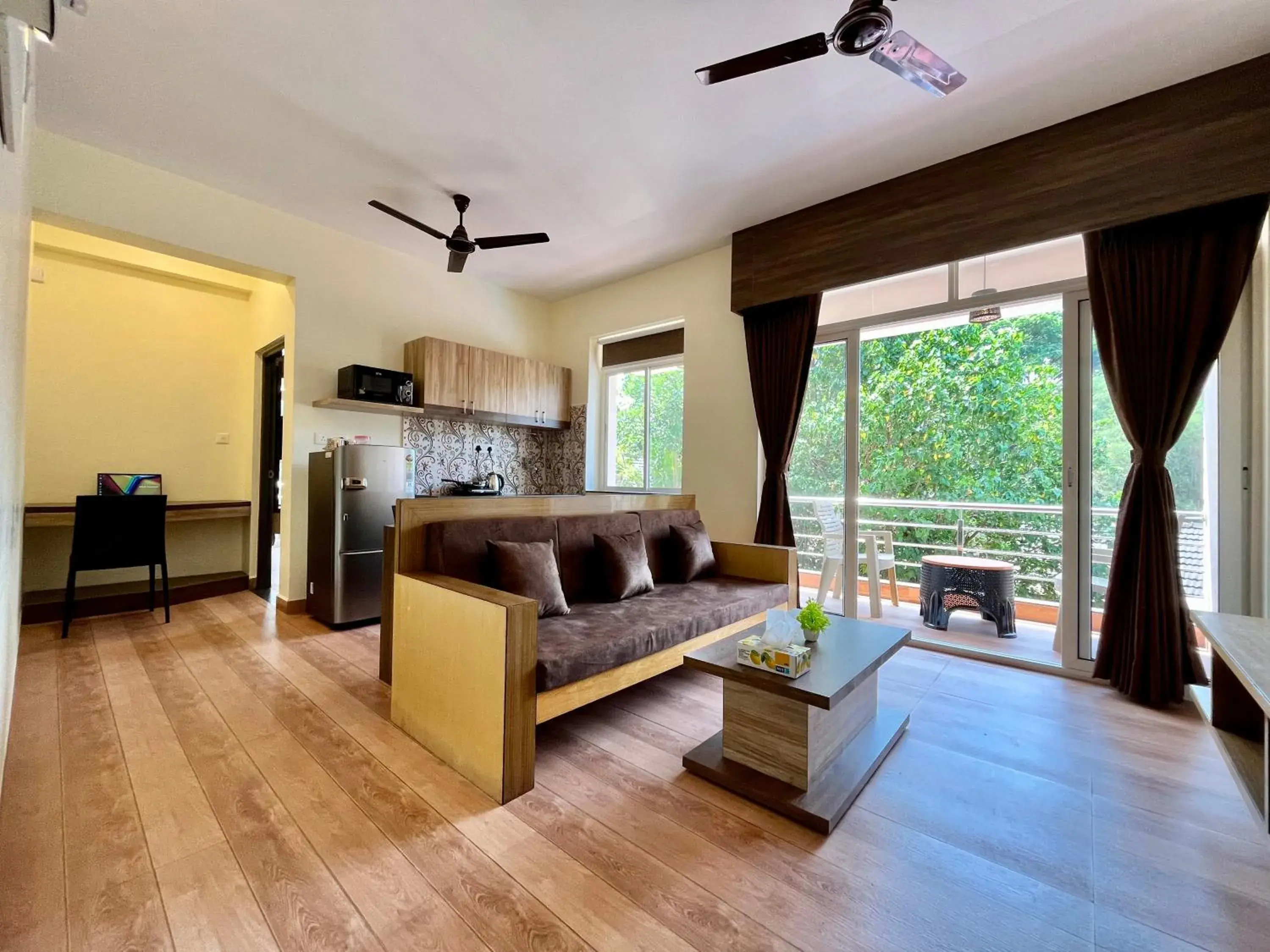 Living room in Lykke Suites- 2-min Drive to Colva Beach-By Goan Felicidade Hospitality PVT LTD Living room in Lykke Suites- 2-min Drive to Colva Beach-By Goan Felicidade Hospitality PVT LTD
