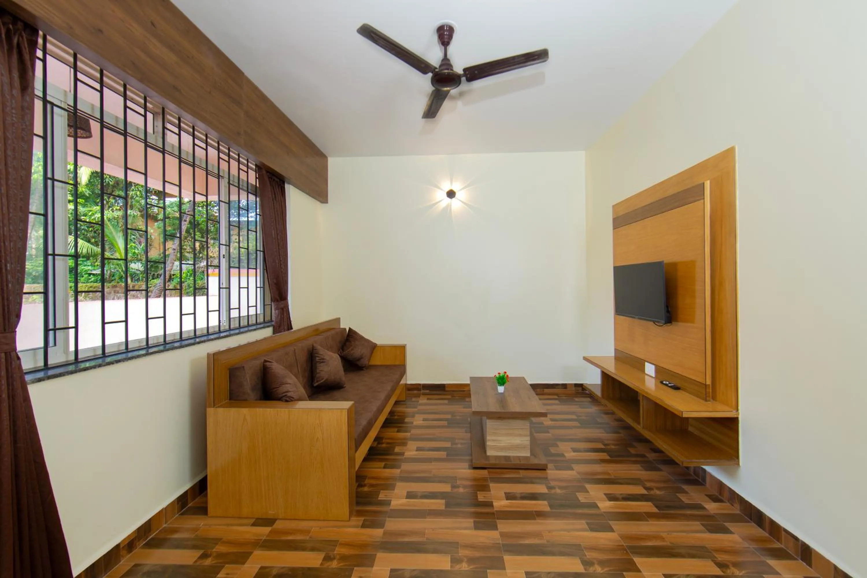 TV and multimedia in Lykke Suites- 2-min Drive to Colva Beach-By Goan Felicidade Hospitality PVT LTD