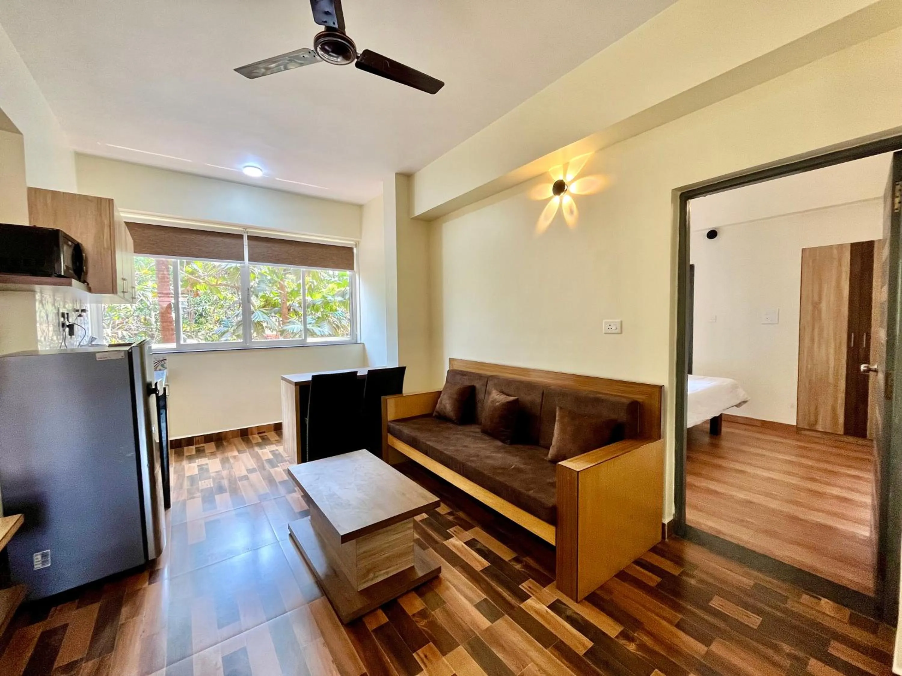 Living room in Lykke Suites- 2-min Drive to Colva Beach-By Goan Felicidade Hospitality PVT LTD