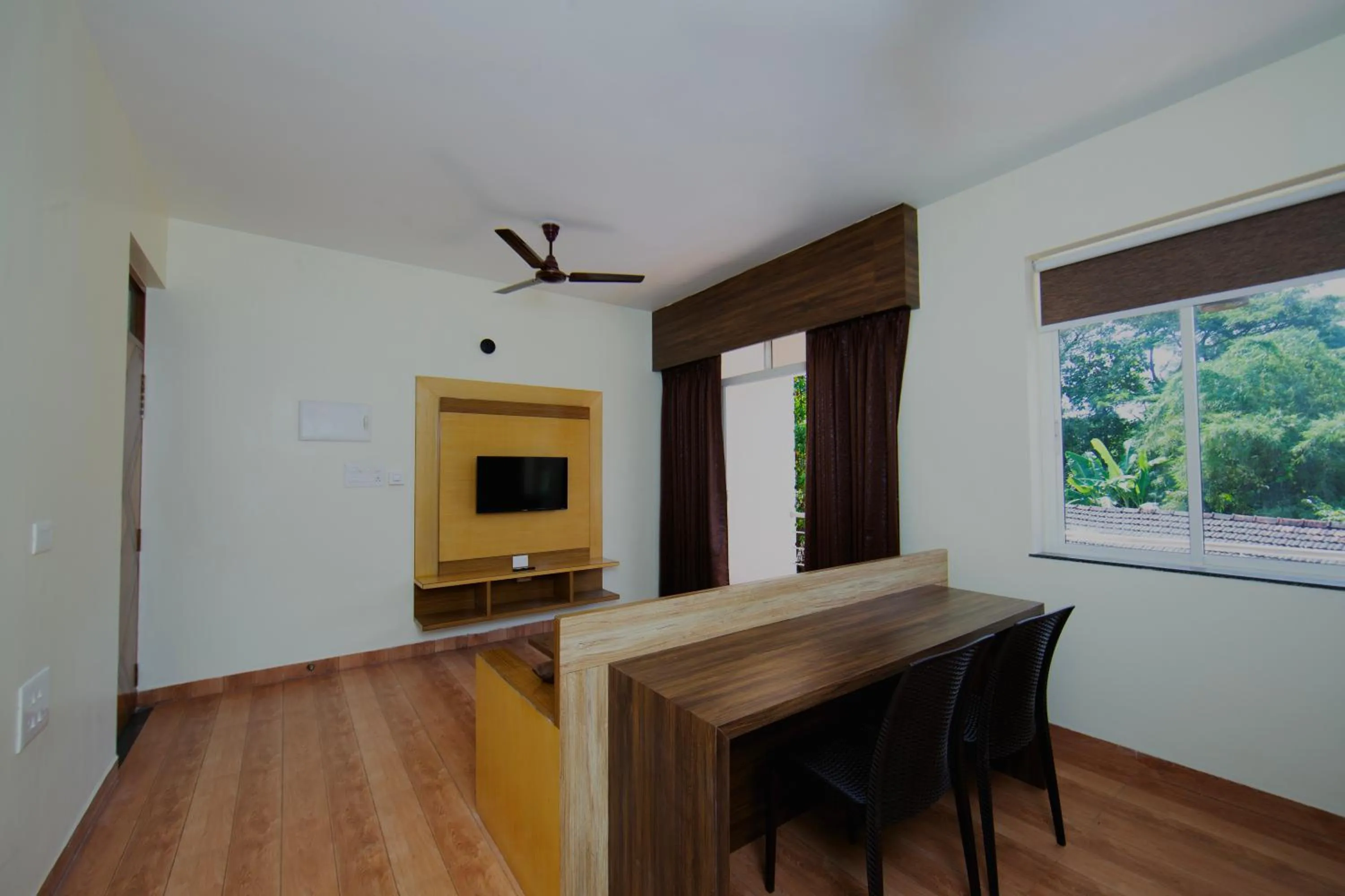 TV and multimedia in Lykke Suites- 2-min Drive to Colva Beach-By Goan Felicidade Hospitality PVT LTD