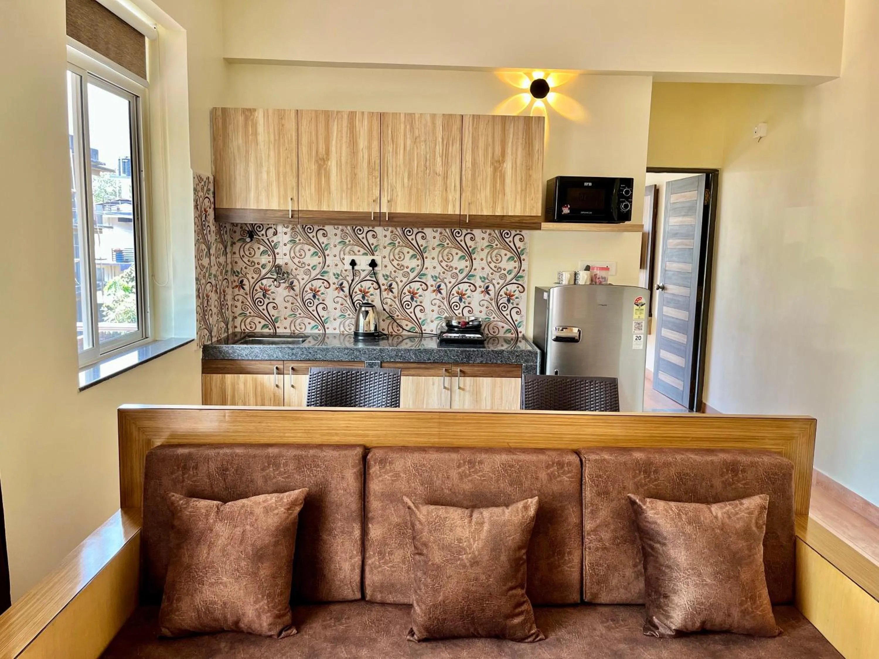 Kitchen or kitchenette in Lykke Suites- 2-min Drive to Colva Beach-By Goan Felicidade Hospitality PVT LTD