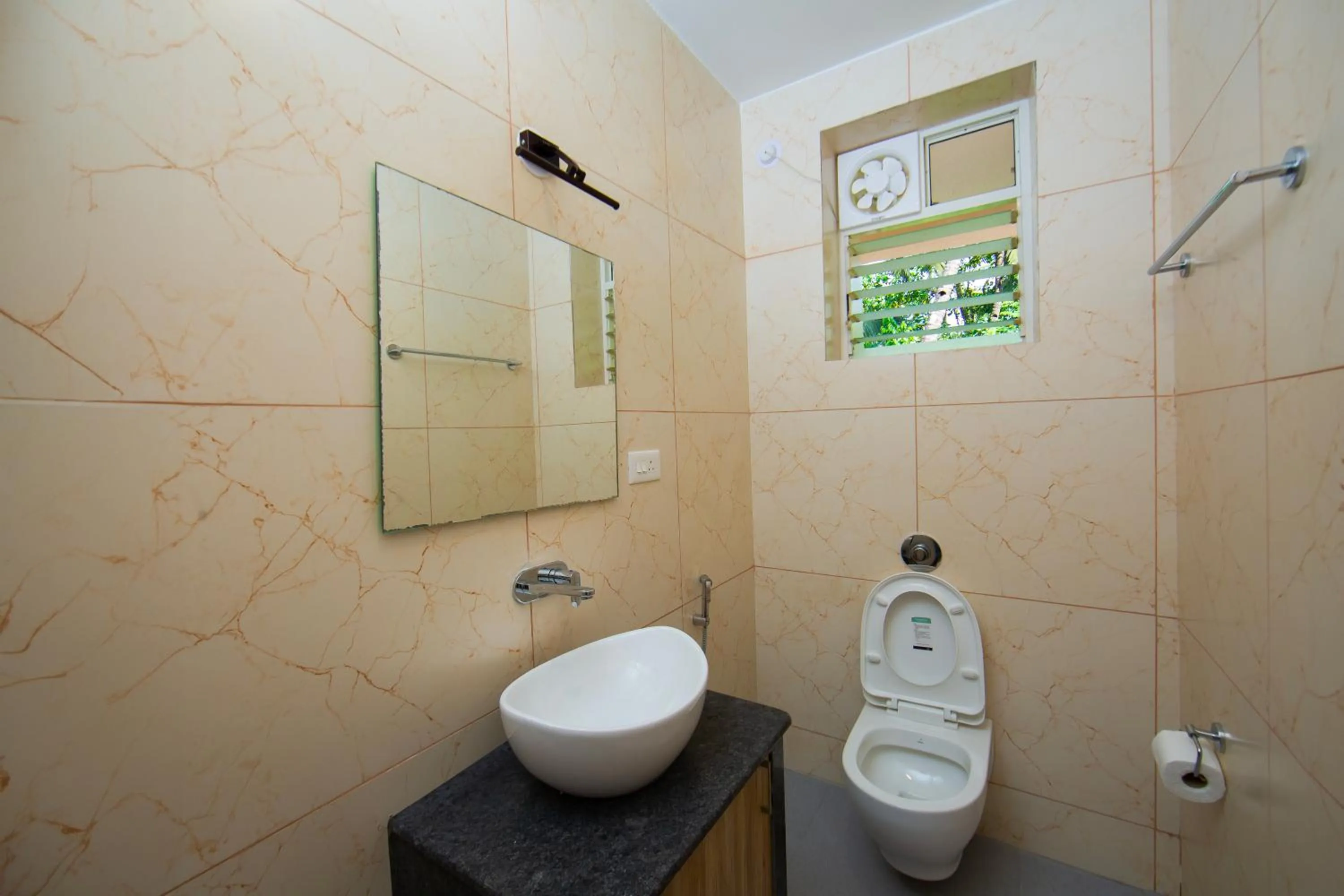 Toilet in Lykke Suites- 2-min Drive to Colva Beach-By Goan Felicidade Hospitality PVT LTD