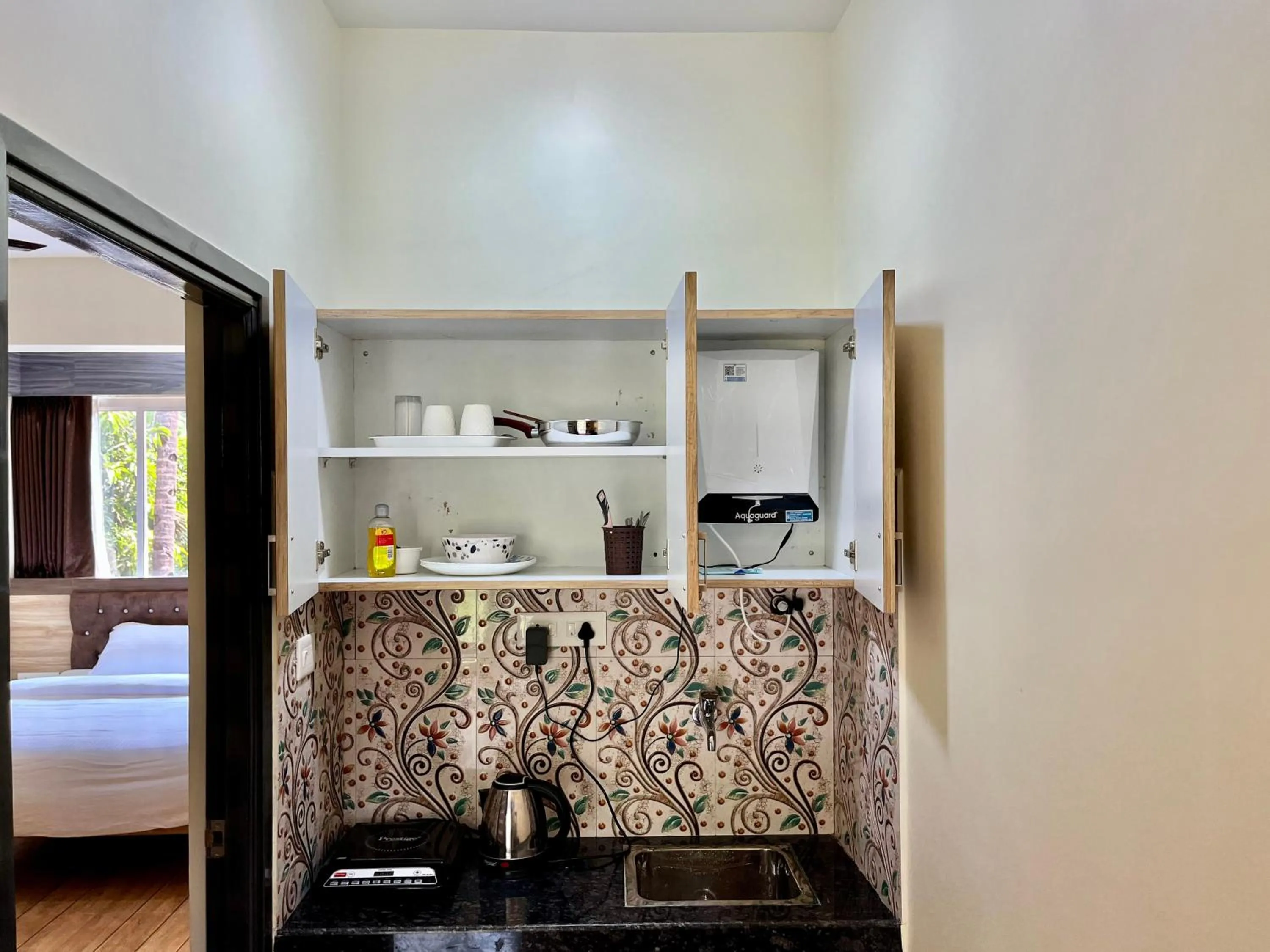 Kitchen or kitchenette, Bed in Lykke Suites- 2-min Drive to Colva Beach-By Goan Felicidade Hospitality PVT LTD