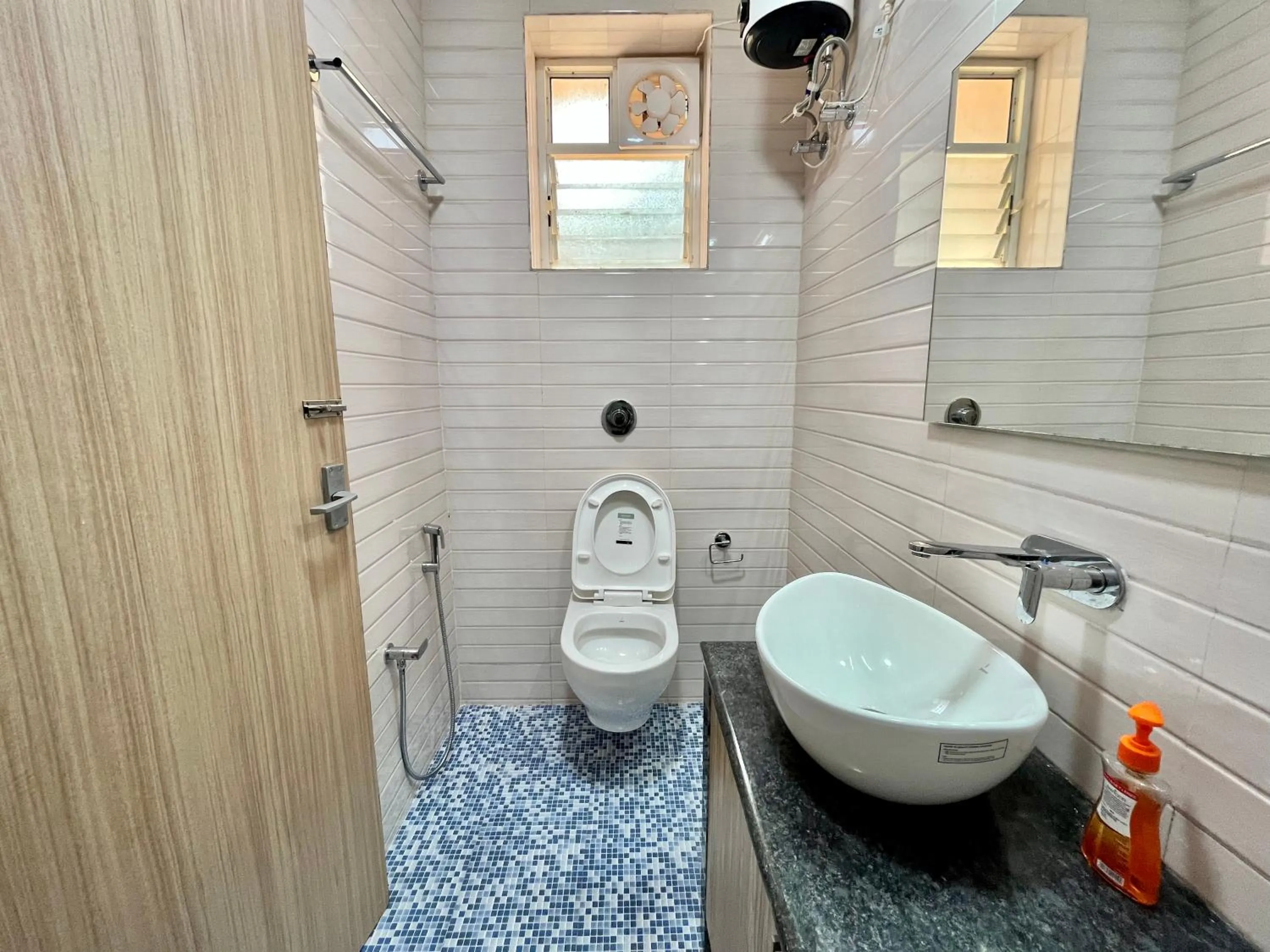 Toilet in Lykke Suites- 2-min Drive to Colva Beach-By Goan Felicidade Hospitality PVT LTD