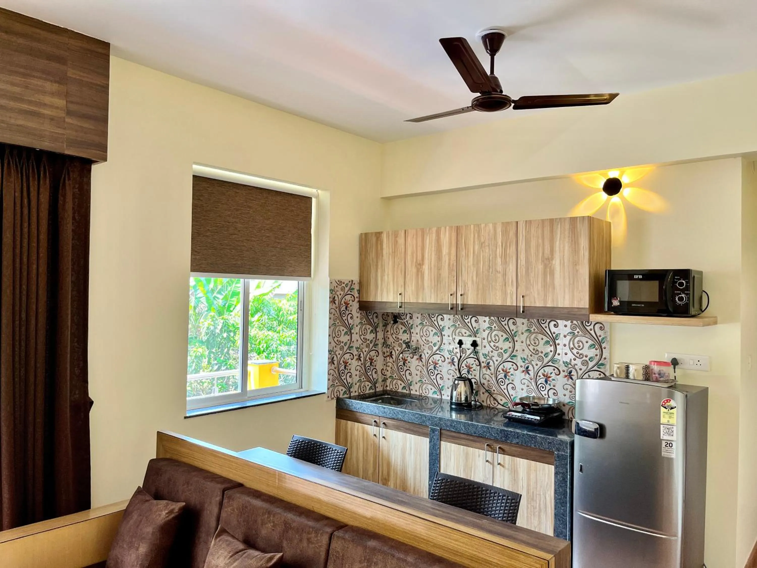 Kitchen or kitchenette in Lykke Suites- 2-min Drive to Colva Beach-By Goan Felicidade Hospitality PVT LTD