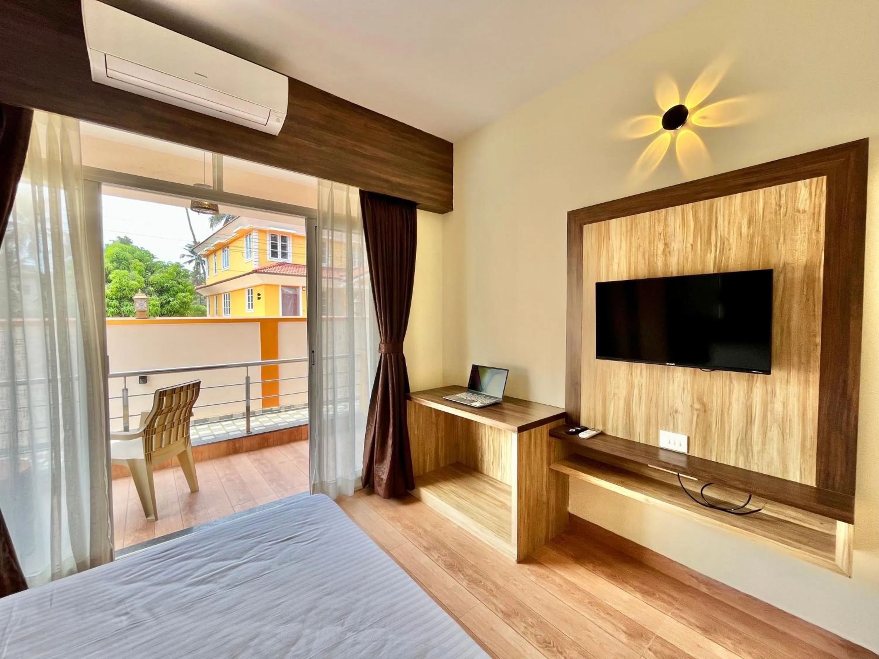 TV and multimedia, Bed in Lykke Suites- 2-min Drive to Colva Beach-By Goan Felicidade Hospitality PVT LTD