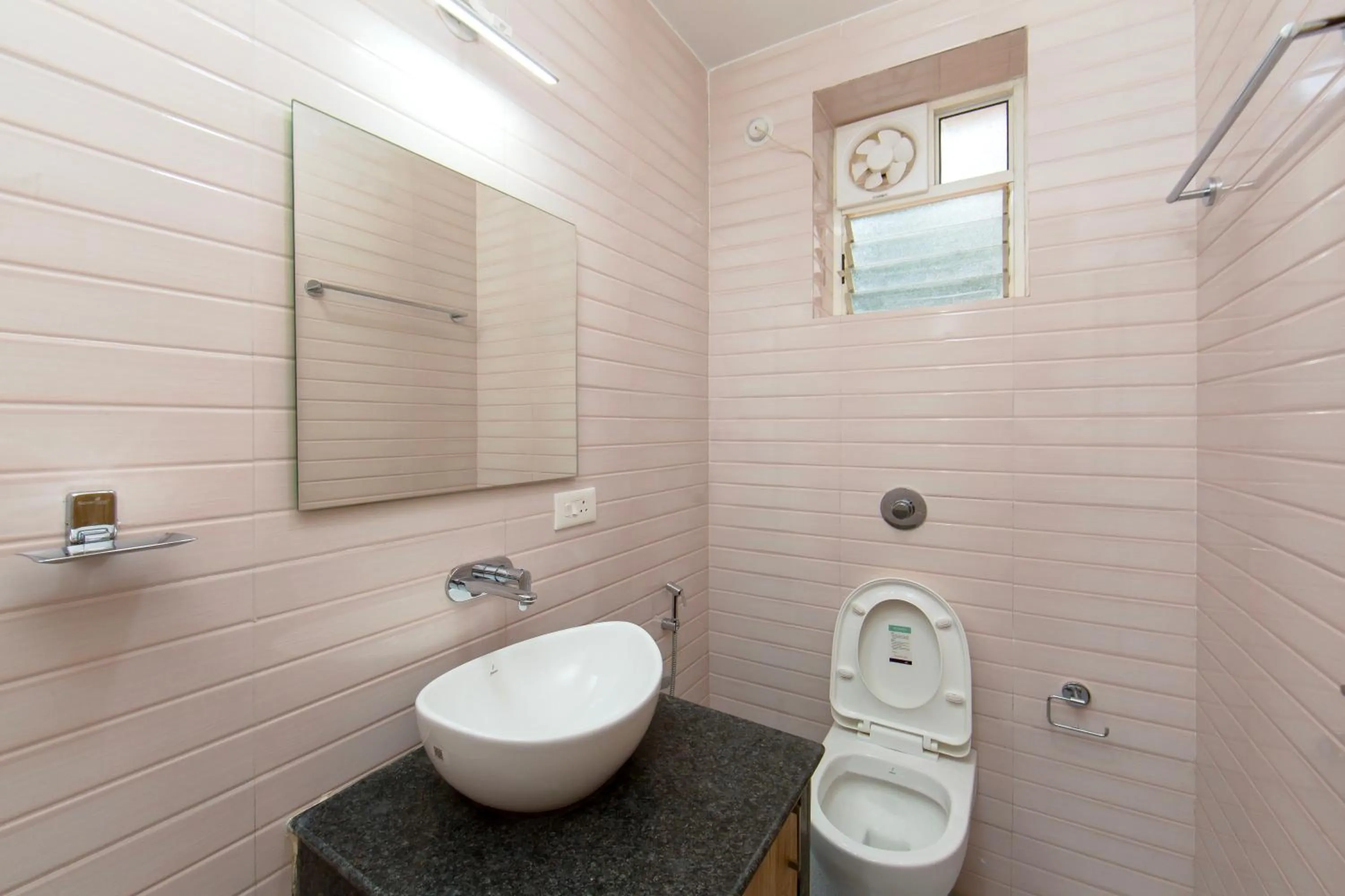 Toilet in Lykke Suites- 2-min Drive to Colva Beach-By Goan Felicidade Hospitality PVT LTD