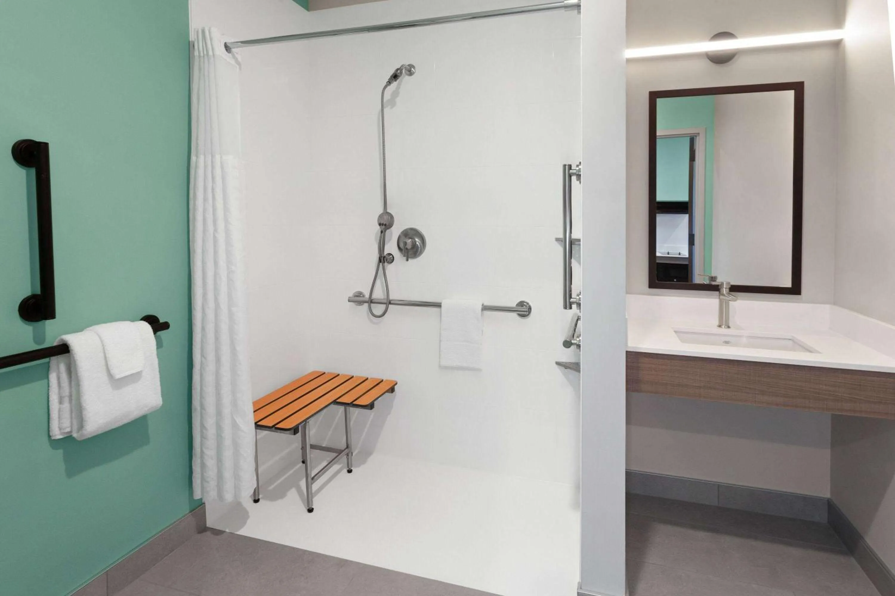 Shower in ECHO Suites Extended Stay by Wyndham Madison