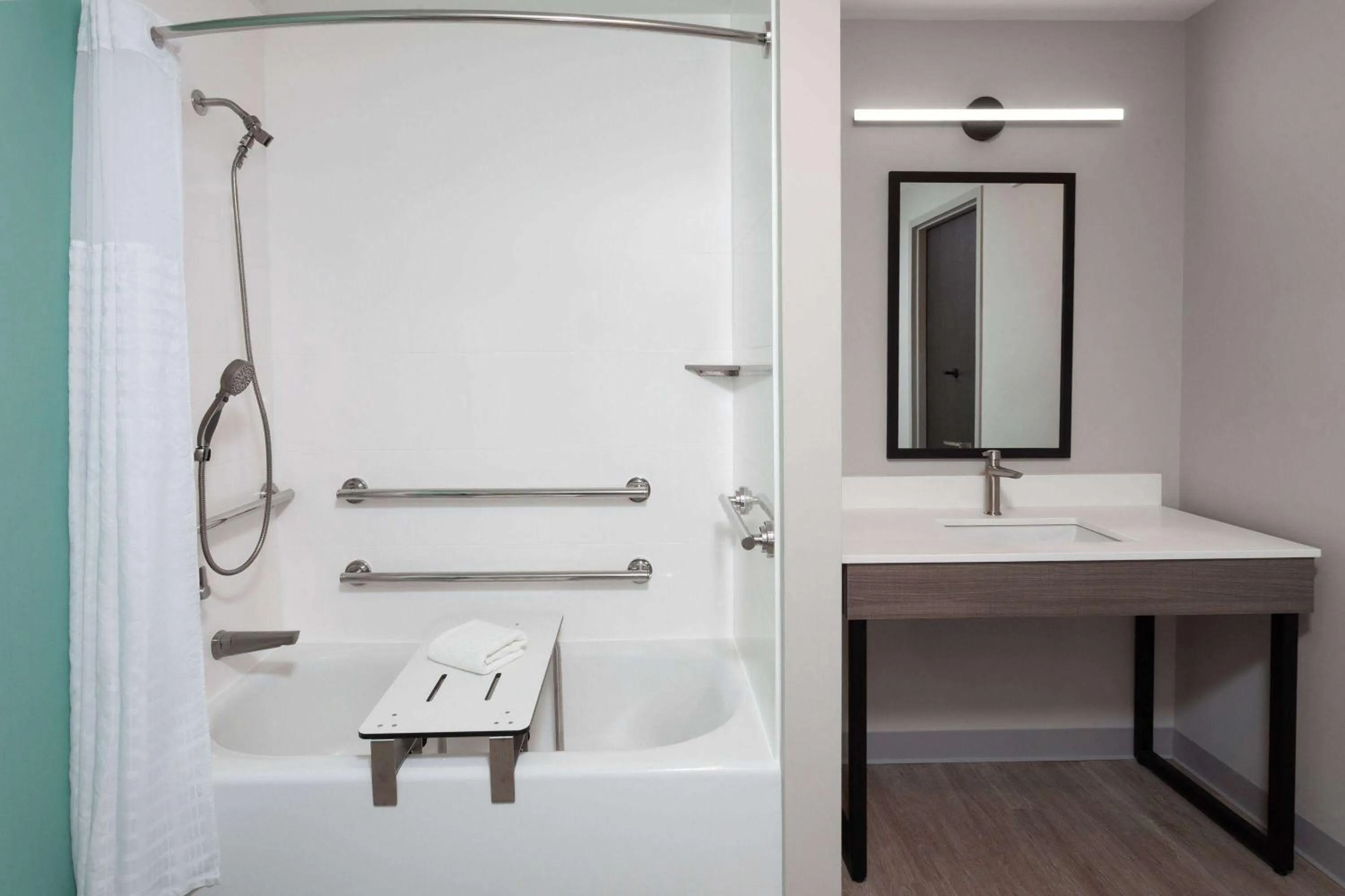 Shower in ECHO Suites Extended Stay by Wyndham Madison