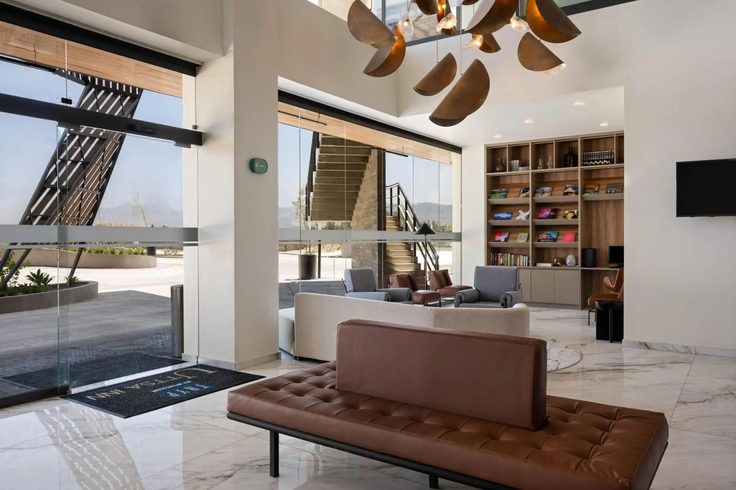 Lobby or reception in TRYP By Wyndham Ciudad Guzmán UTTSA Lobby or reception in TRYP By Wyndham Ciudad Guzmán UTTSA