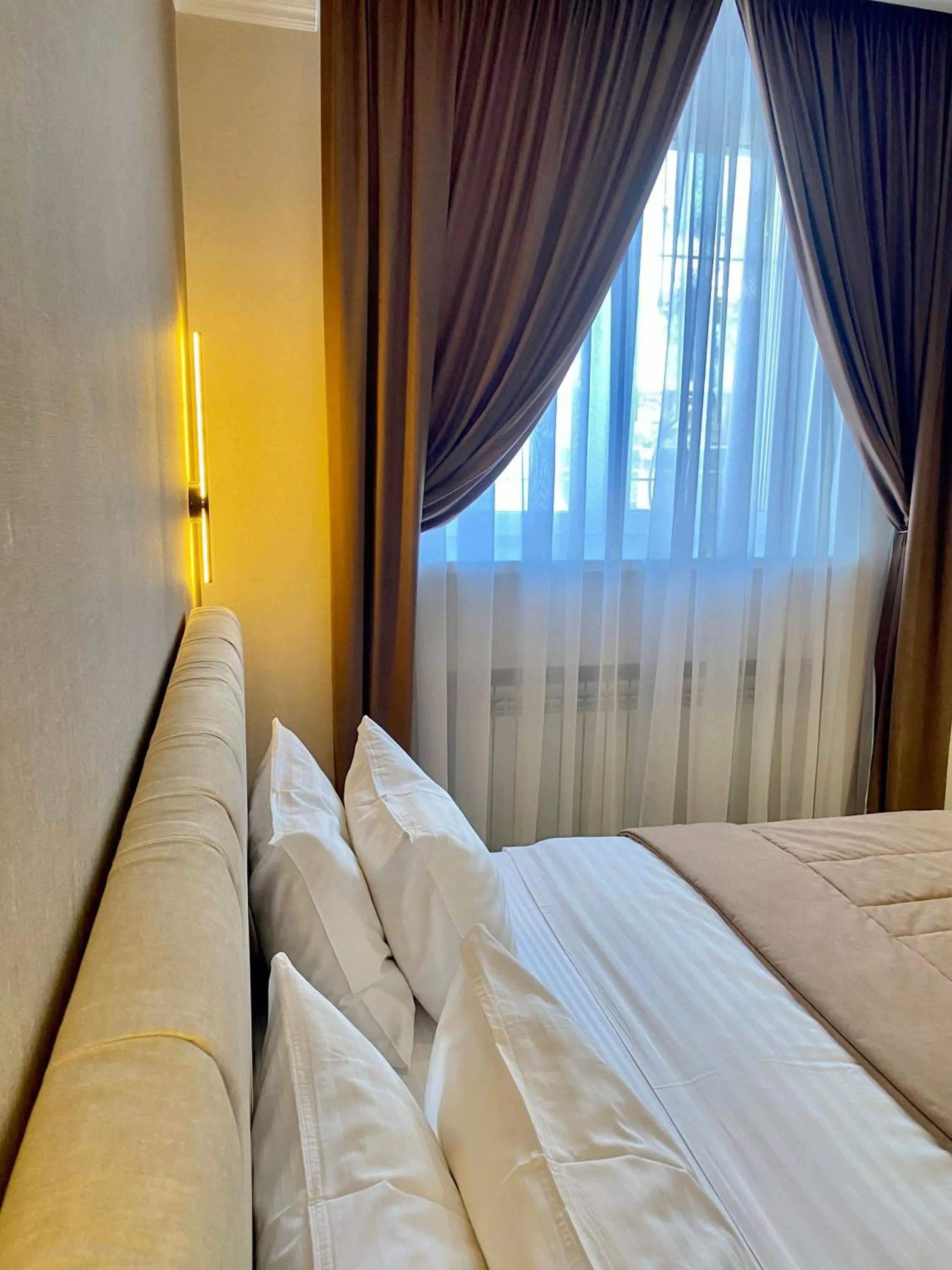 Bed in Grand Christer Hotel