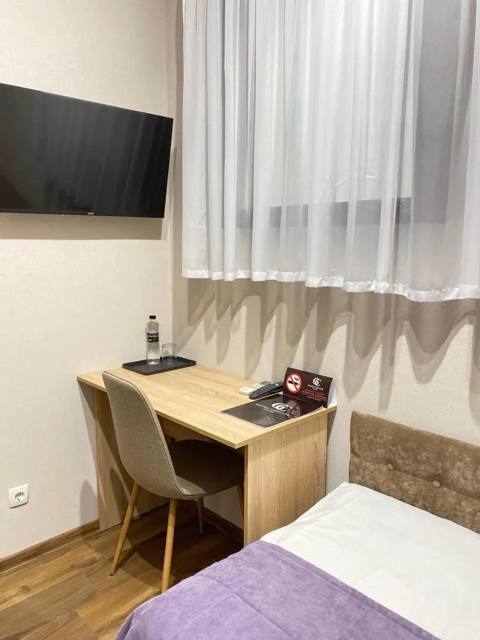 Bed in Grand Christer Hotel