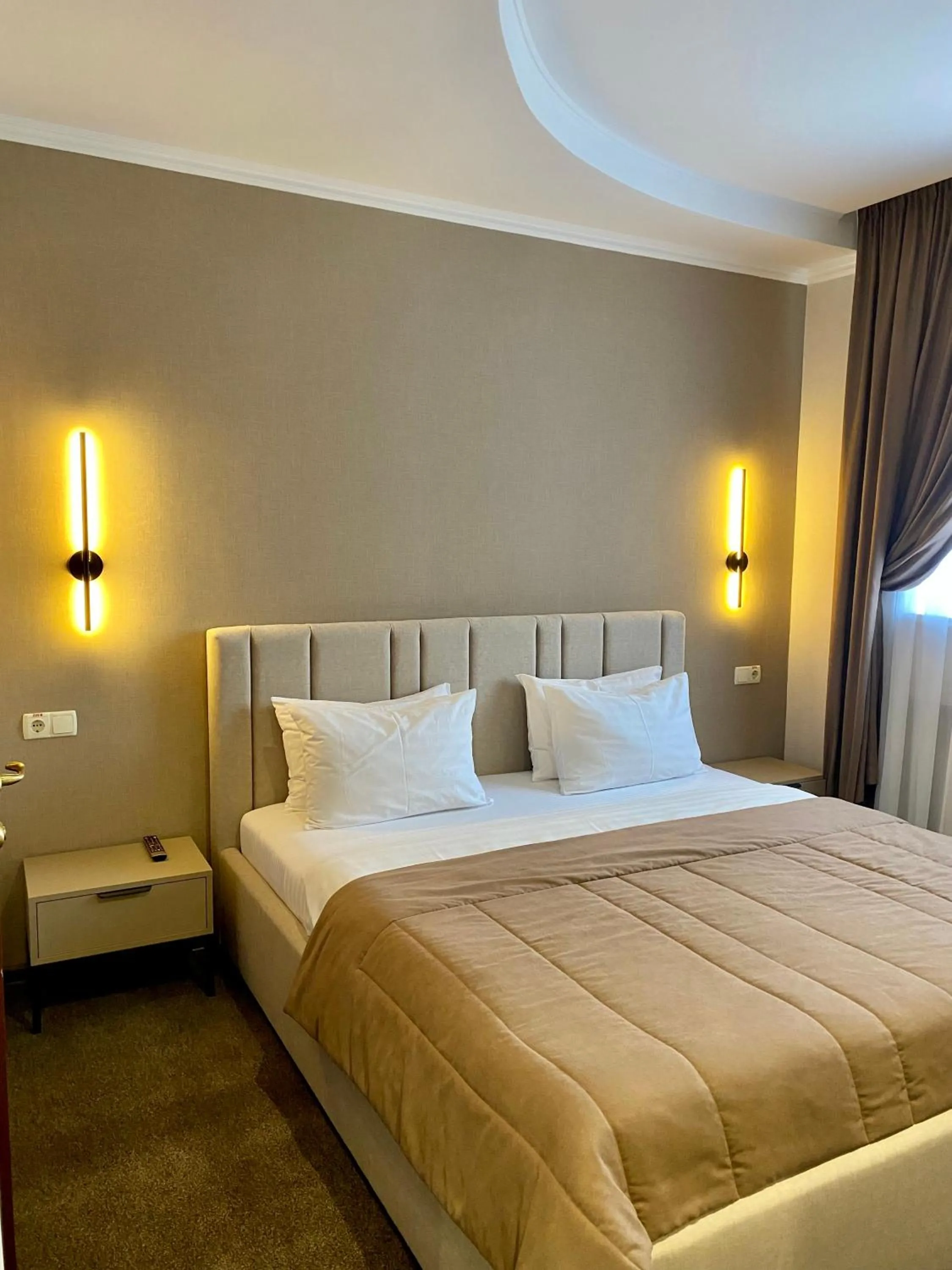 Bed in Grand Christer Hotel