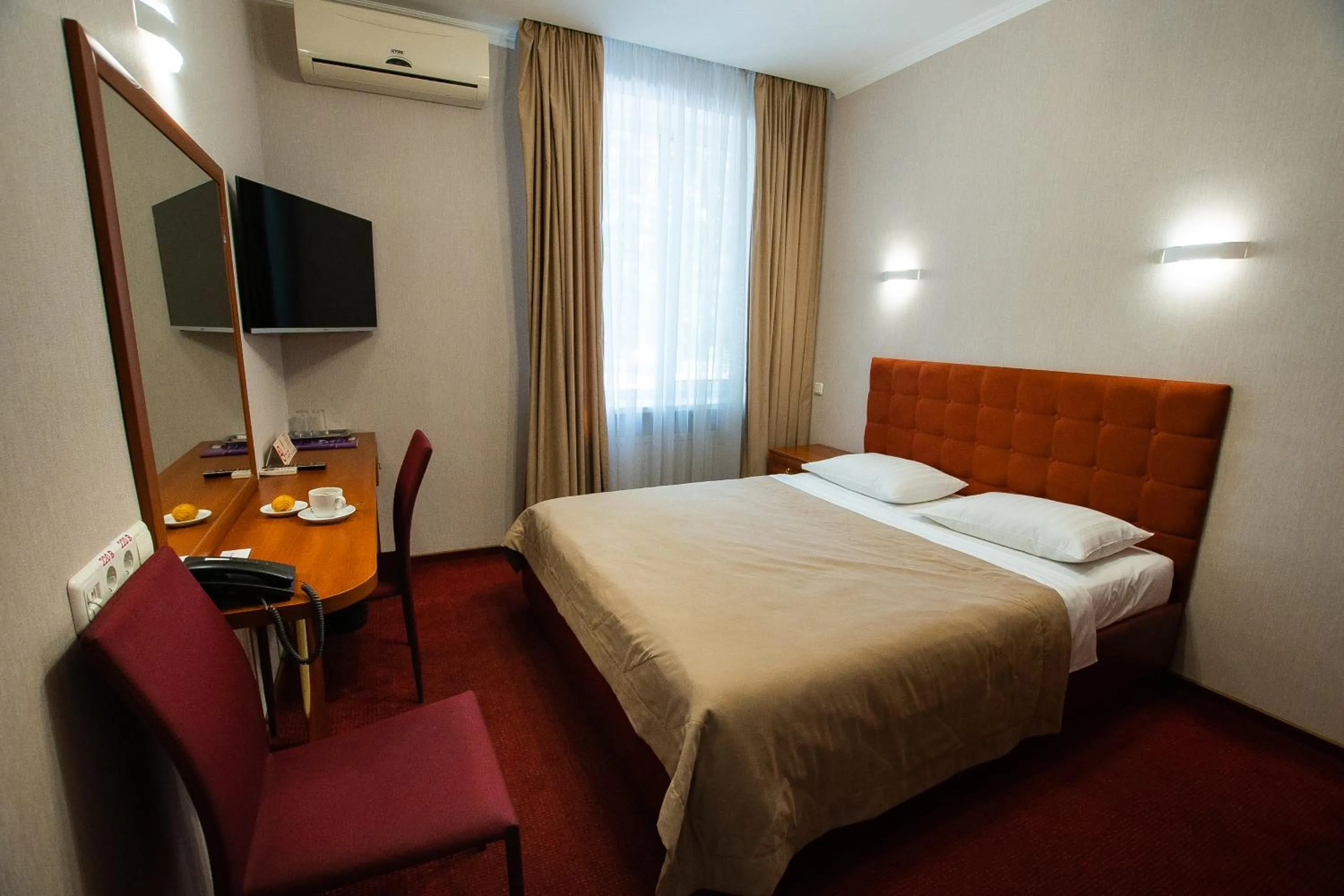 Photo of the whole room, Bed in Grand Christer Hotel