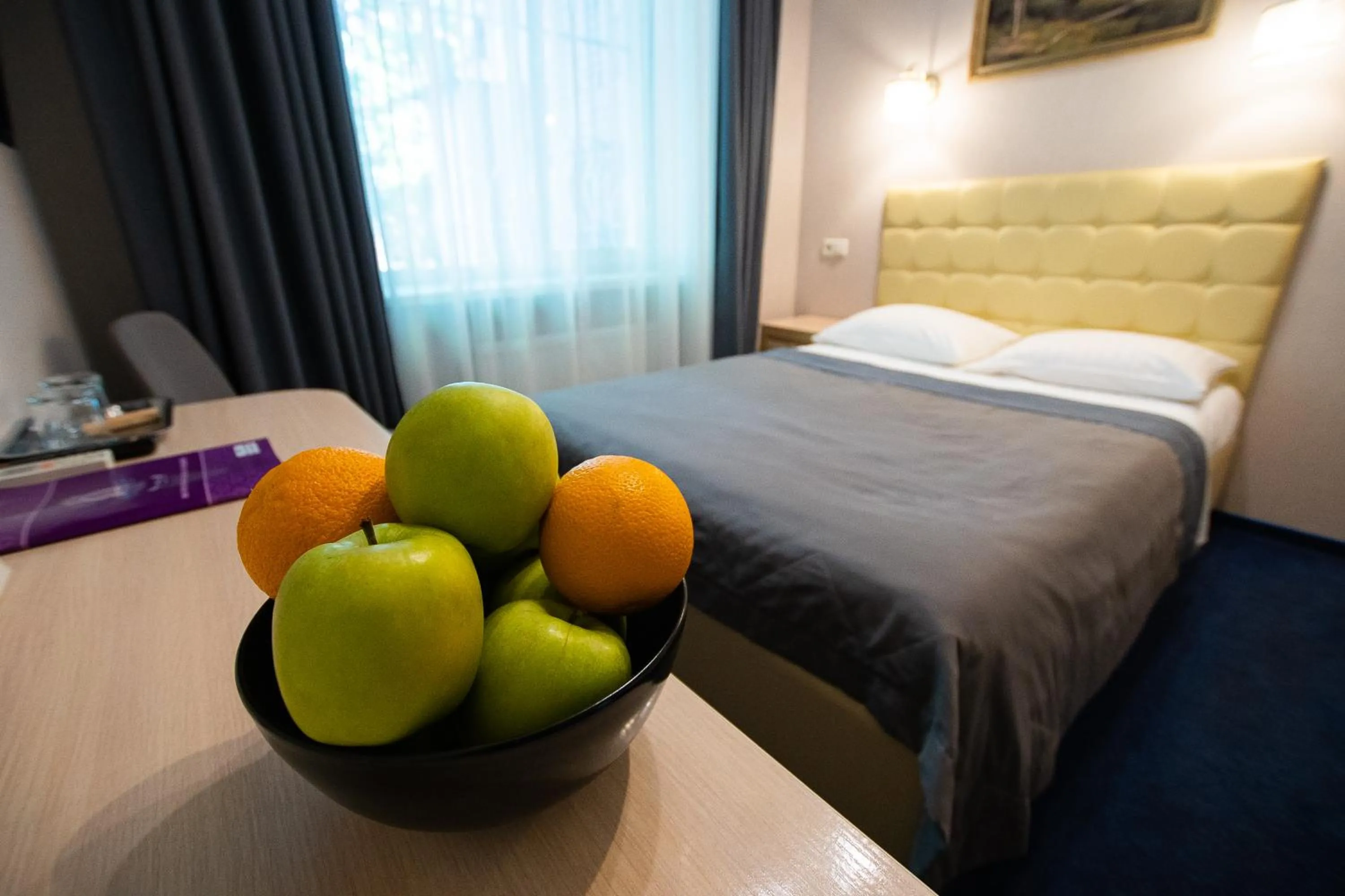 Bed in Grand Christer Hotel