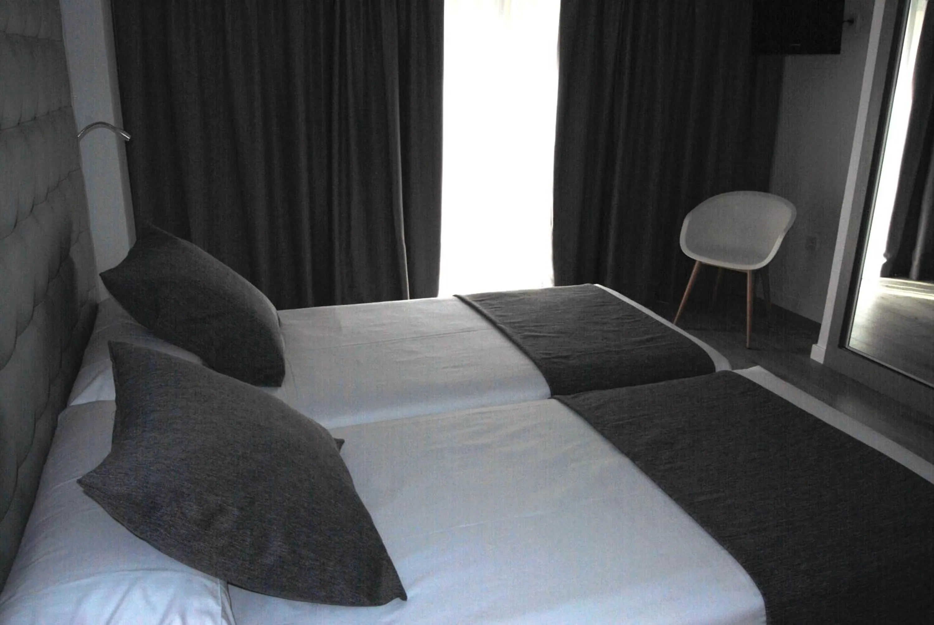Bed in Estudiotel Alicante