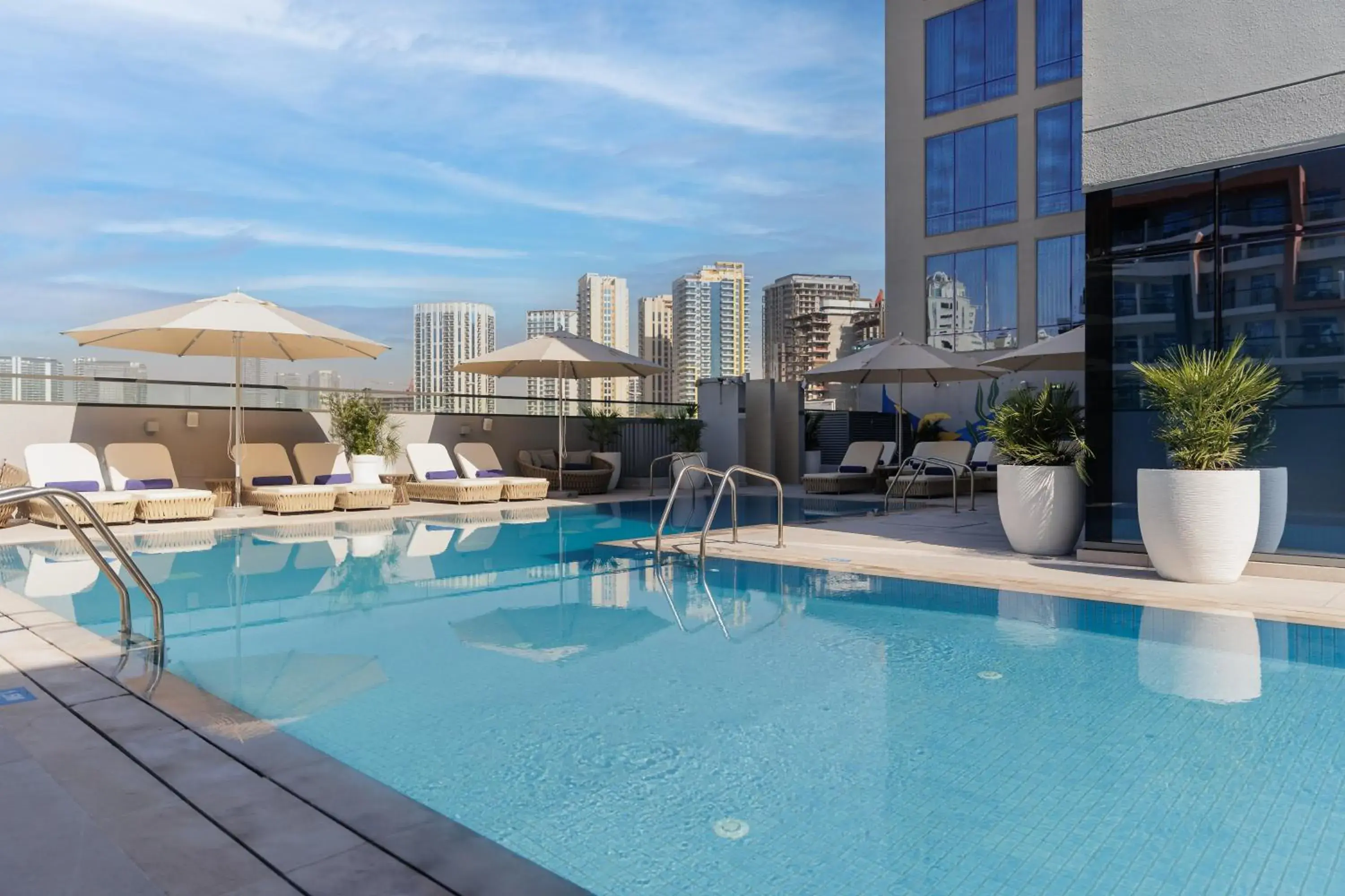 Property building in Holiday Inn Dubai Jumeirah Village Circle by IHG Property building in Holiday Inn Dubai Jumeirah Village Circle by IHG
