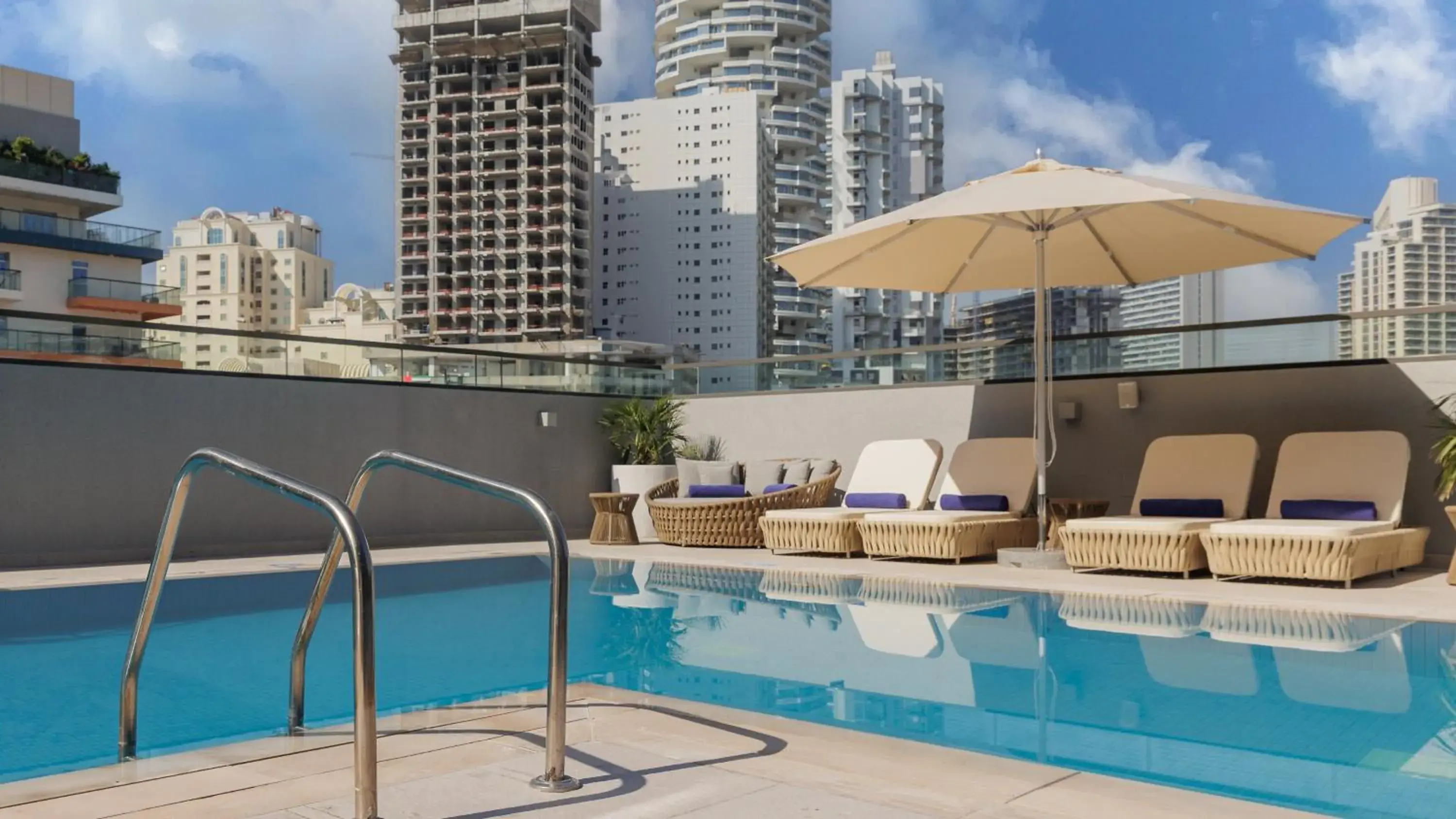 Swimming pool in Holiday Inn Dubai Jumeirah Village Circle by IHG Swimming pool in Holiday Inn Dubai Jumeirah Village Circle by IHG
