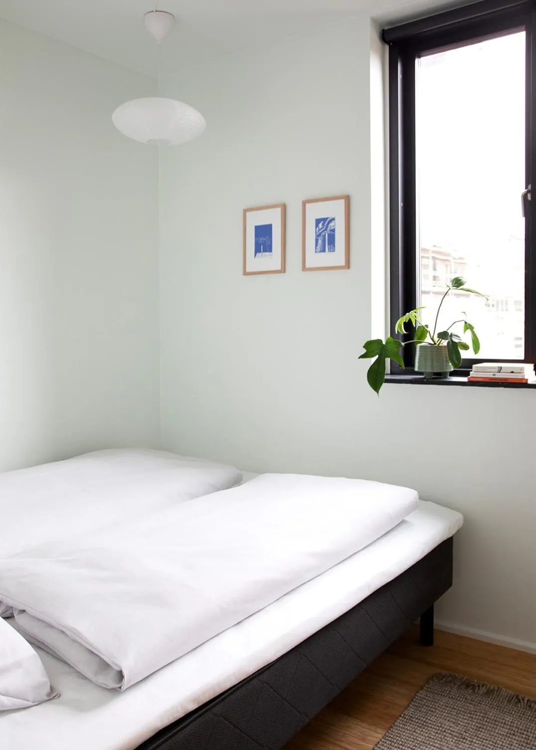 Bed in Nordhus Guest Apartments