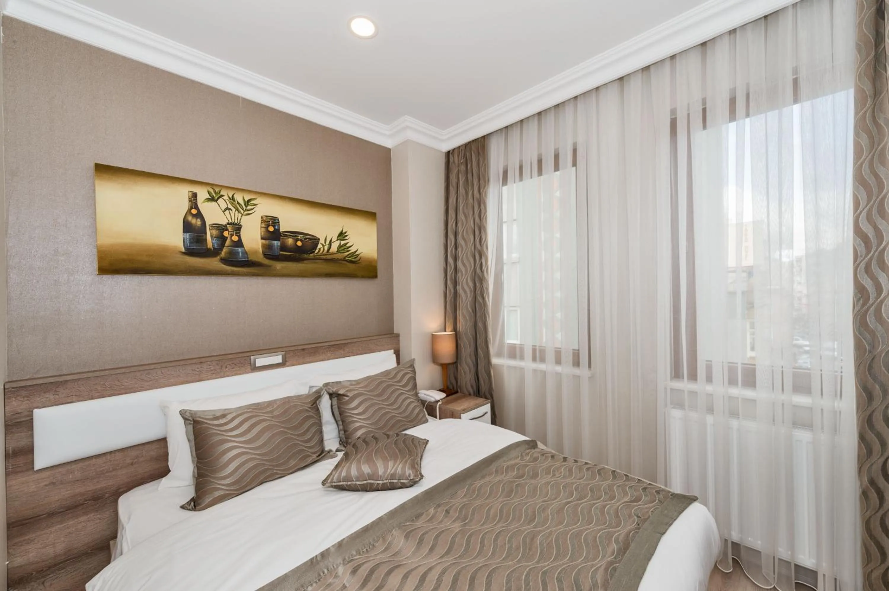 Bed in Alphonse Hotel