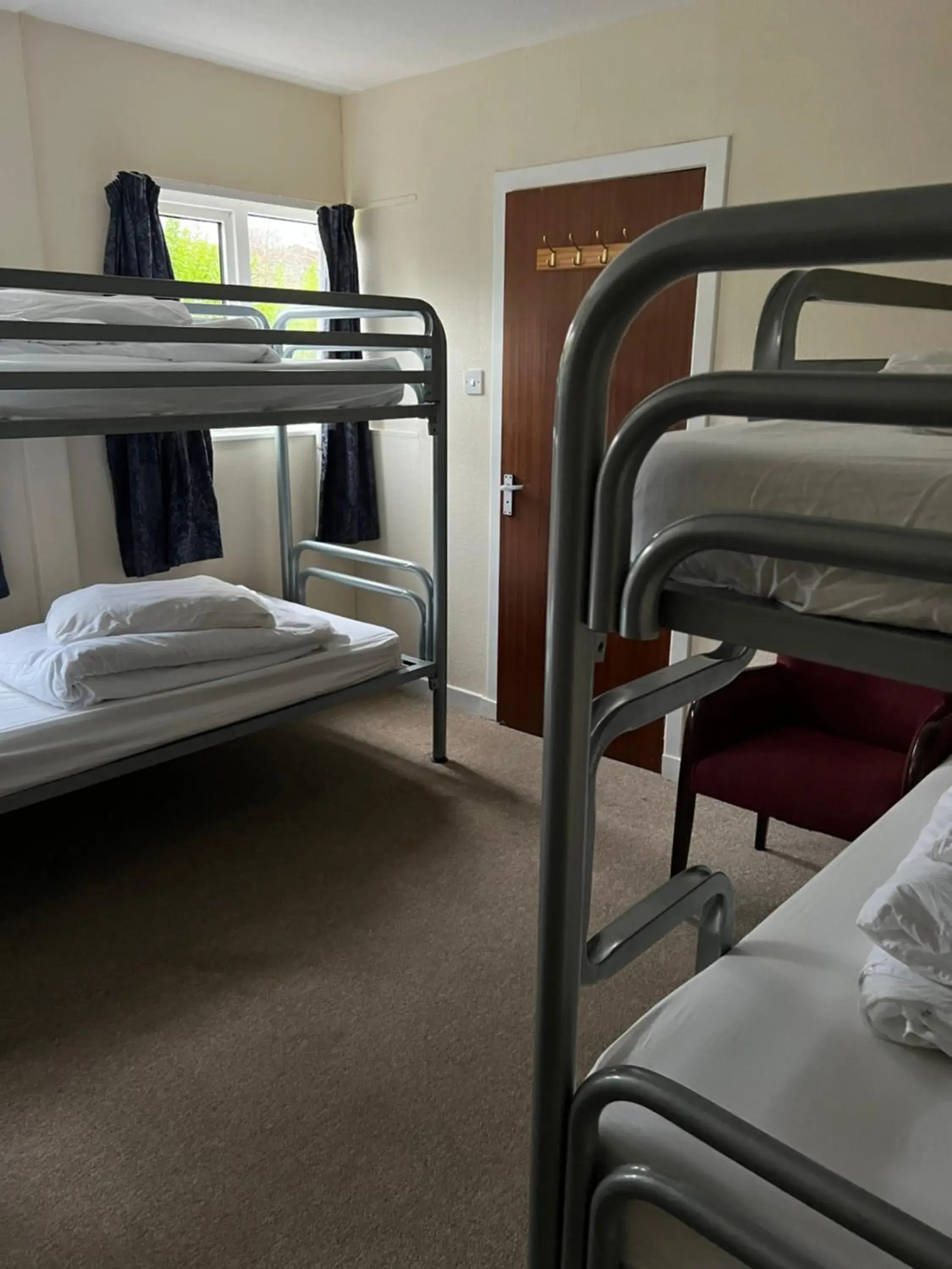 Quadruple Room with Bathroom in Saucy Mary's Hostel Quadruple Room with Bathroom in Saucy Mary's Hostel