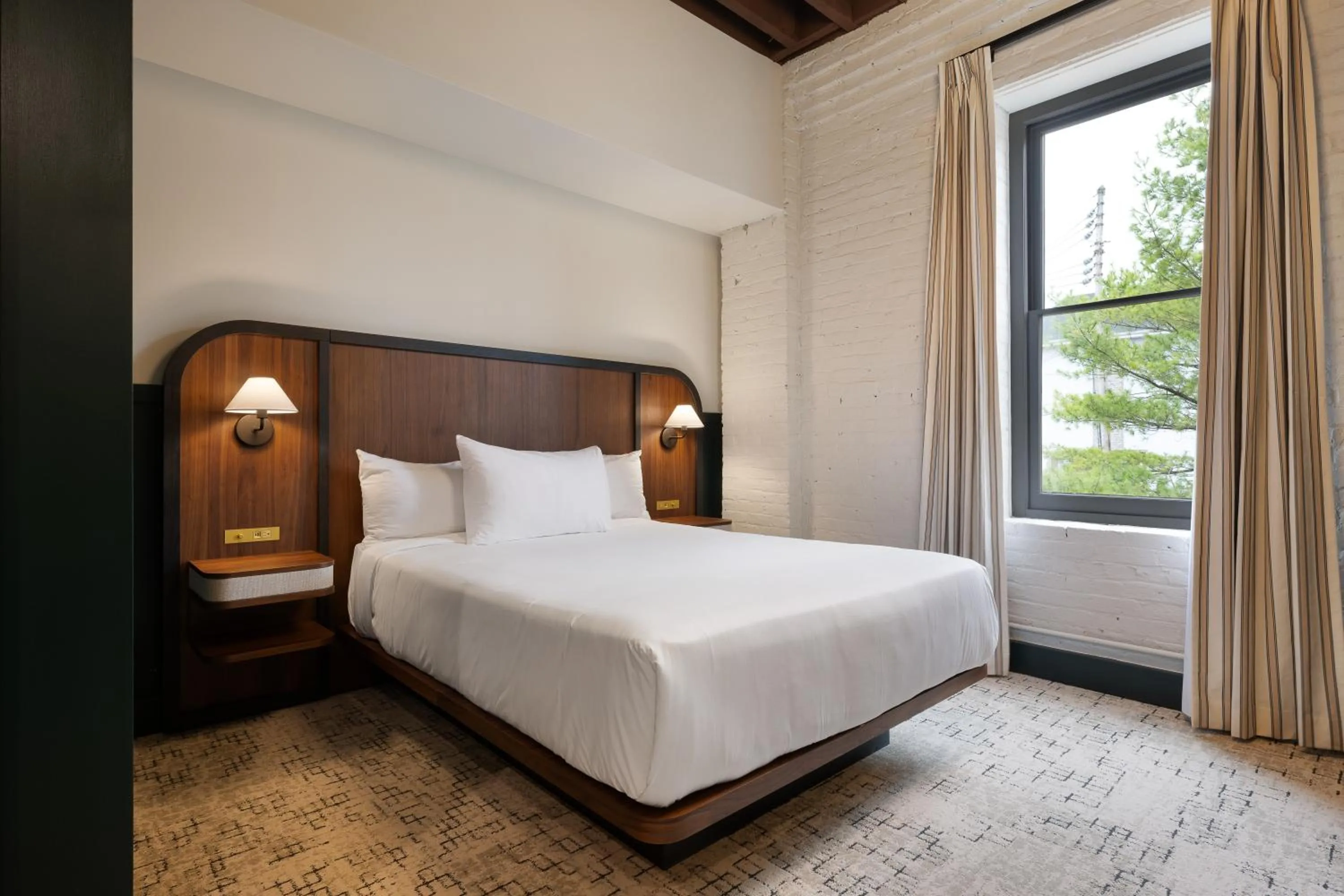 Bed in The Delegate Hotel