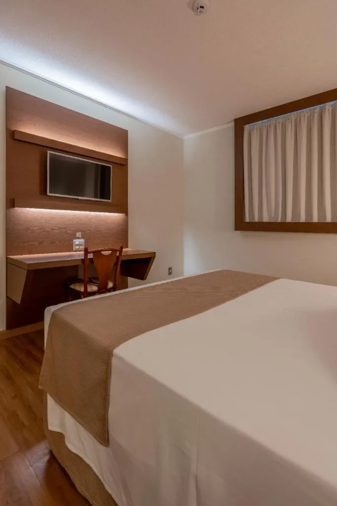 Bed in Hotel Caiuá Cascavel