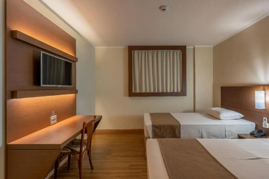 Bed in Hotel Caiuá Cascavel