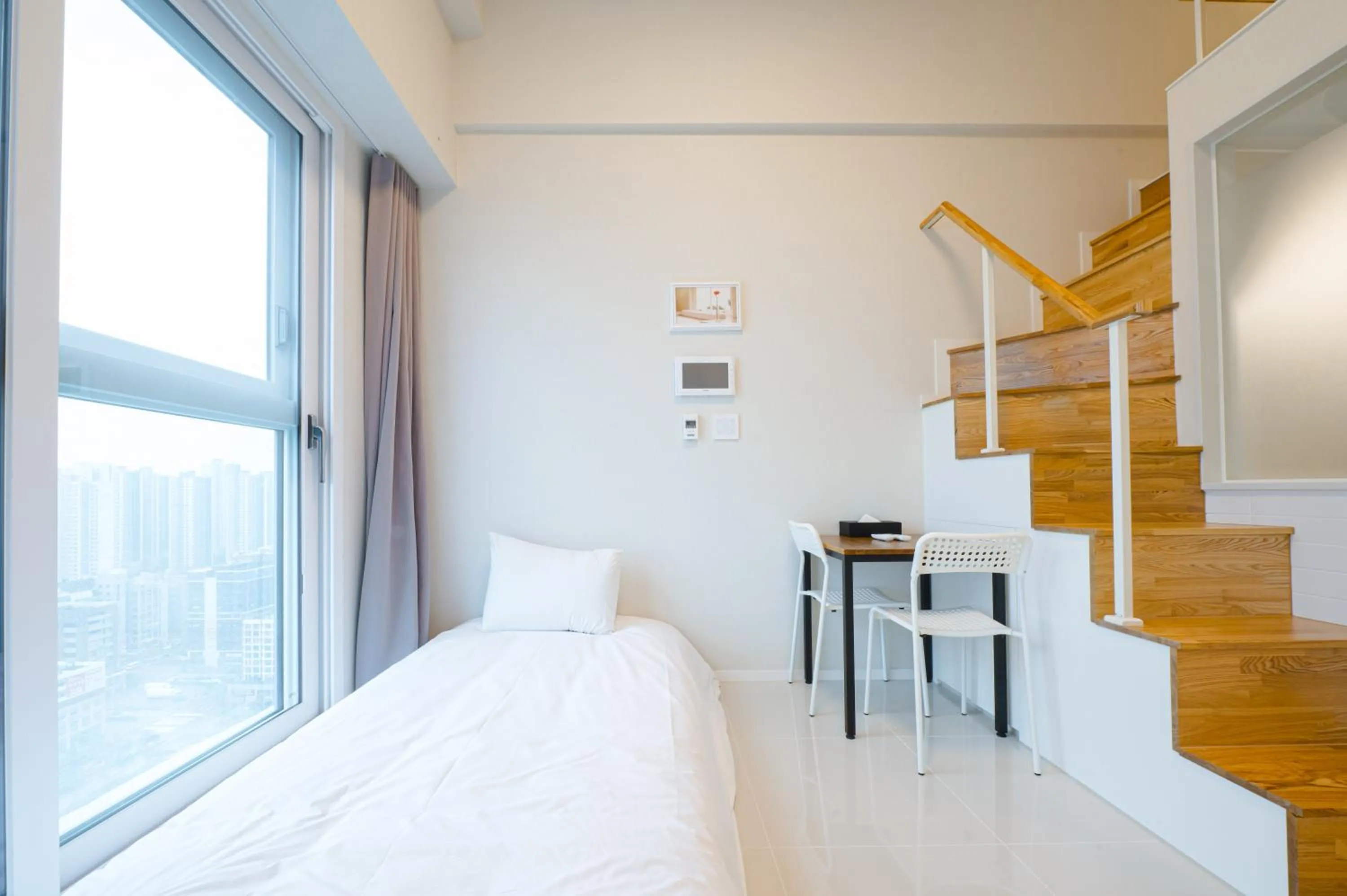 Bed in Blue Ocean Hotel 3