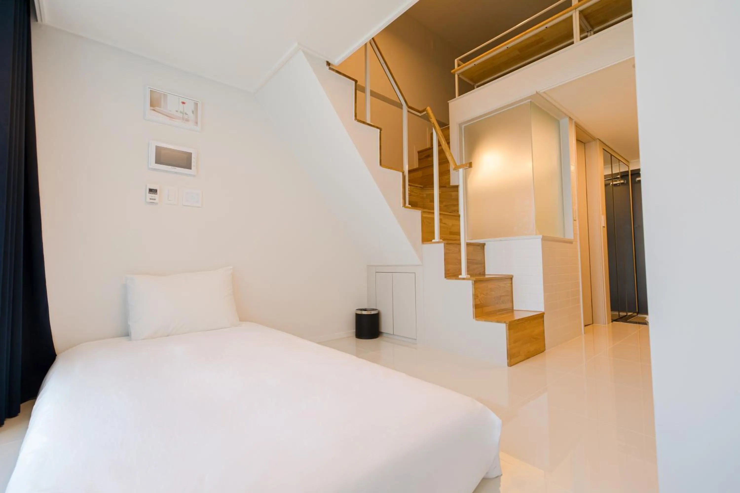 Bed in Blue Ocean Hotel 3