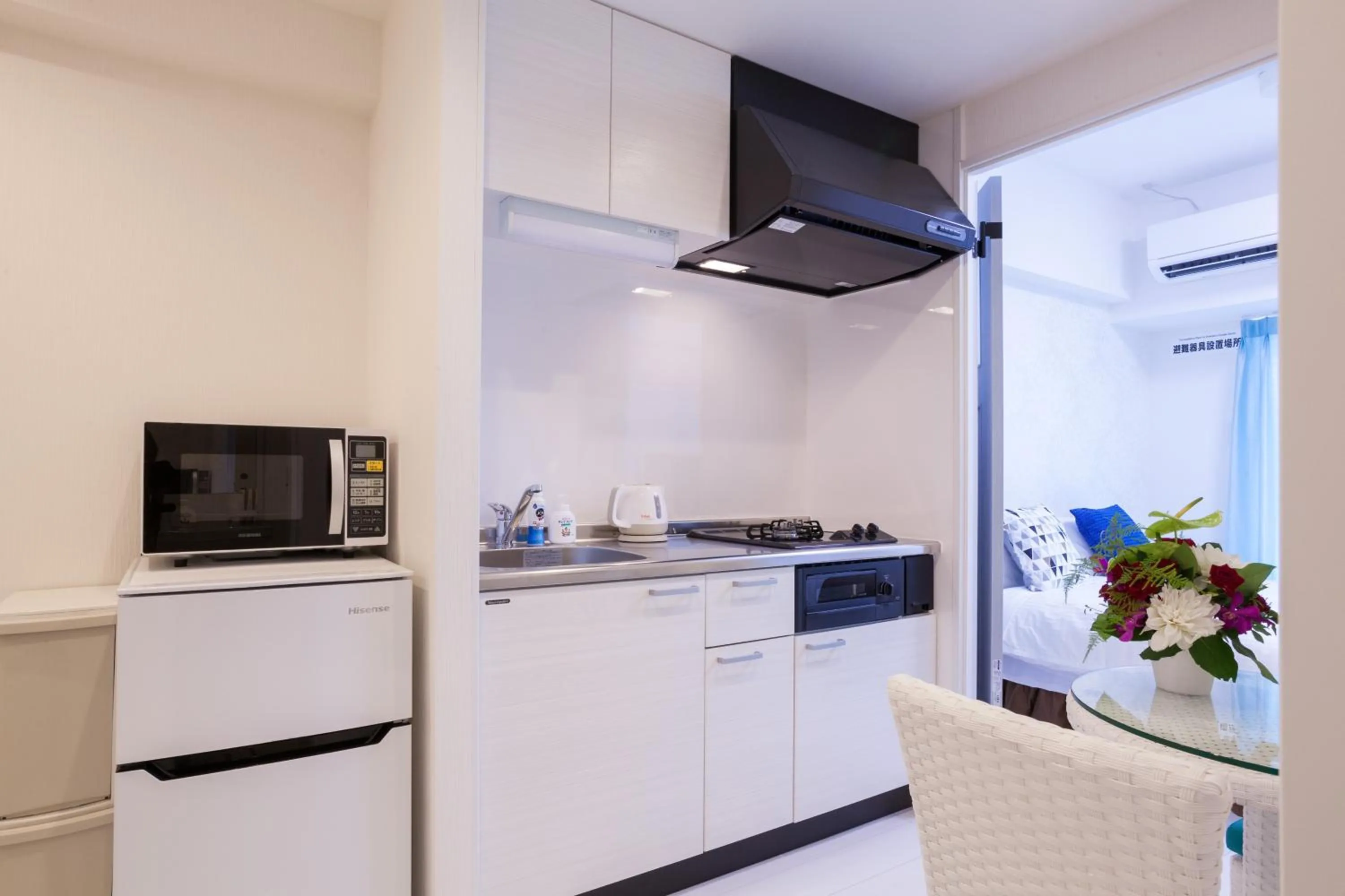 Kitchen or kitchenette in Living Inn Asahibashiekimae Anex